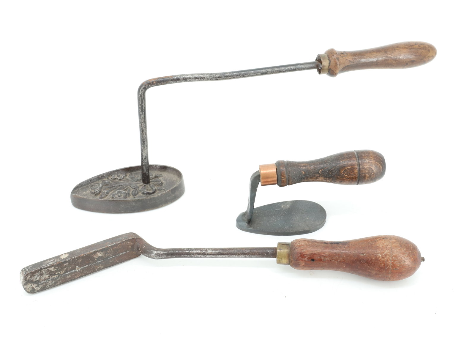 LOT OF (3) HAT IRONS: INCLUDING: ONE WITH EMBOSSED TOP AND FLORAL BOUQUET. ONE WITH UNUSUALLY LONG / THIN. ONE DATED "2014". PLEASE READ CAREFULLY - ITEMS MUST BE PAID FOR THROUGH LIVE AUCTIONEERS OR WITH CASH OR CHECK IN 