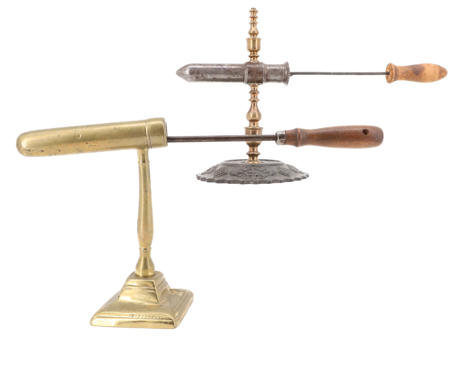 (2) ENGLISH GOFFERING IRONS: SINGLE BARREL WITH HEAT RODS. BRASS AND CAST IRON. ROUND FIGURAL BASE AND TURNED POST 5" BARREL. ONE SOLID BRASS WITH 5" BARREL. PLEASE READ CAREFULLY - ITEMS MUST BE PAID FOR THROUGH LIVE AUCTIONEERS