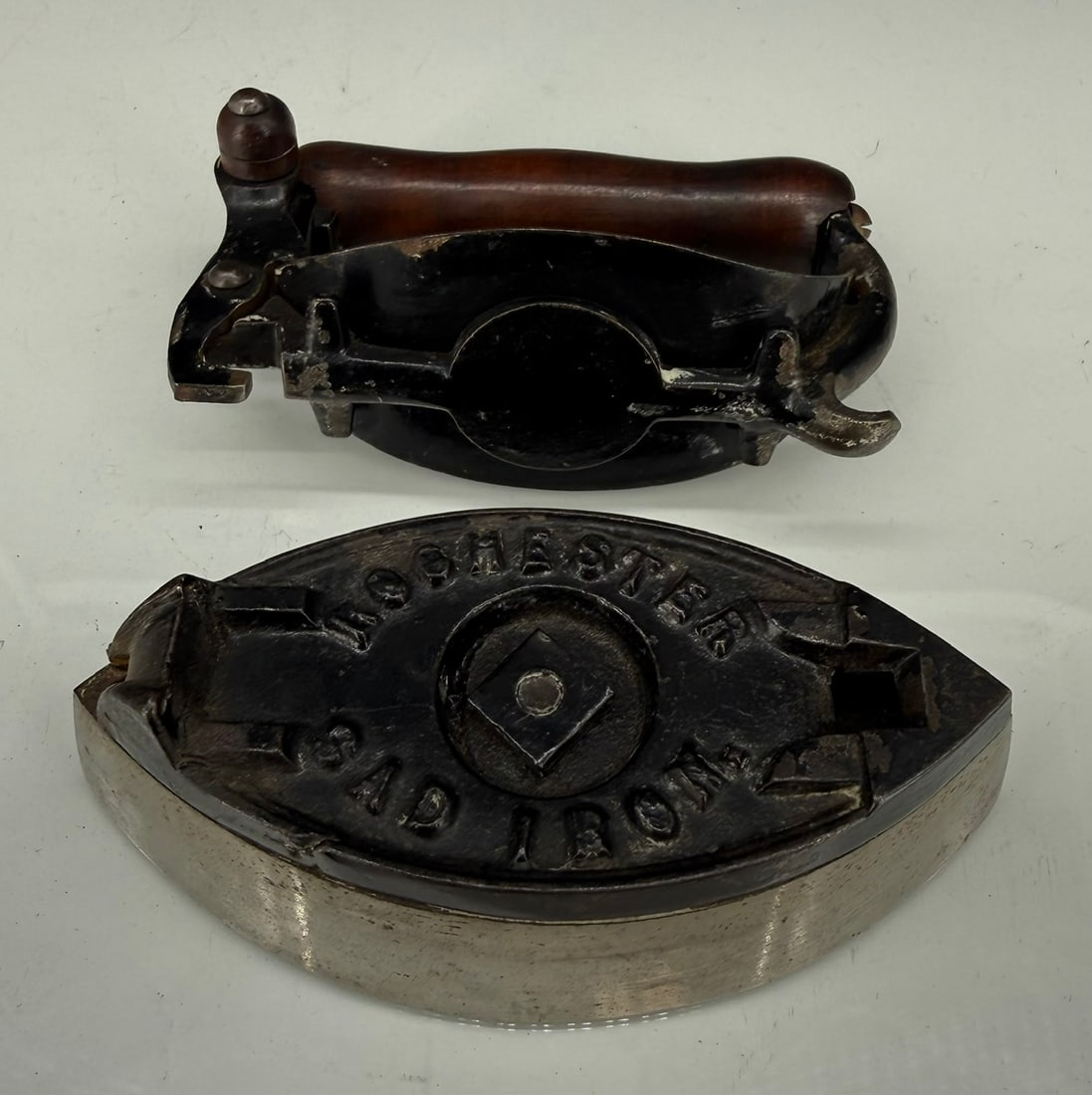 THE LITTLE ROCHESTER DETACHABLE HANDLE IRON: SMALL SIZE, DETACHABLE HANDLE IRON, DOUBLE POINT, BLACK PAINTED HEAT SHIELD, 3 1/2" WITH WOODEN HAND GRIP AND ACORN THUMB LATCH