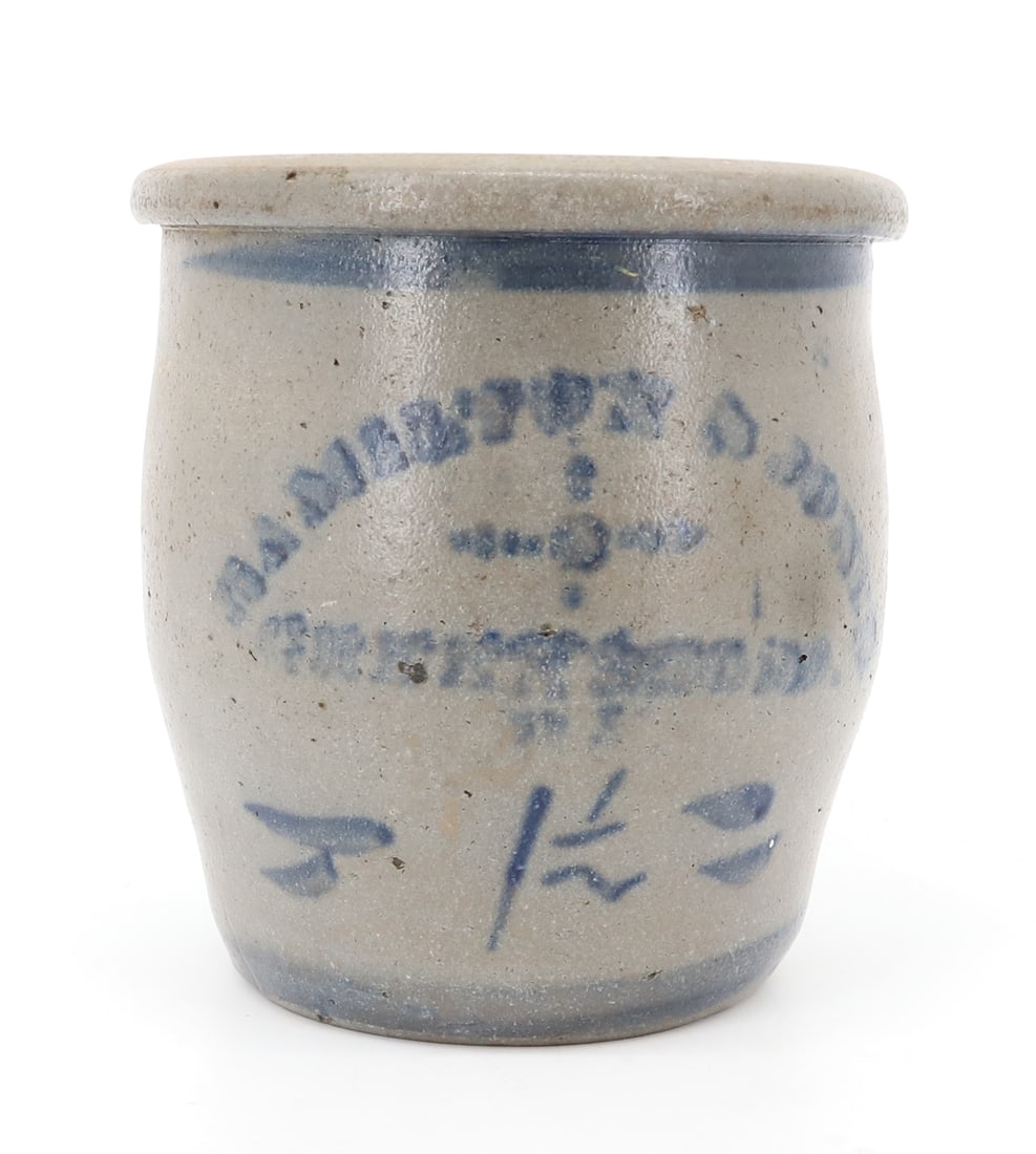 BLUE DECORATED STENCILED CROCK: HAMILTON AND JONES, GREENSBORO, PA - 1 1/2" GALLON, 8 3/4" X 8 1/4" PLEASE READ CAREFULLY - ITEMS MUST BE PAID FOR THROUGH LIVE AUCTIONEERS OR WITH CASH OR CHECK IN PERSON - Terms for Purchasing and
