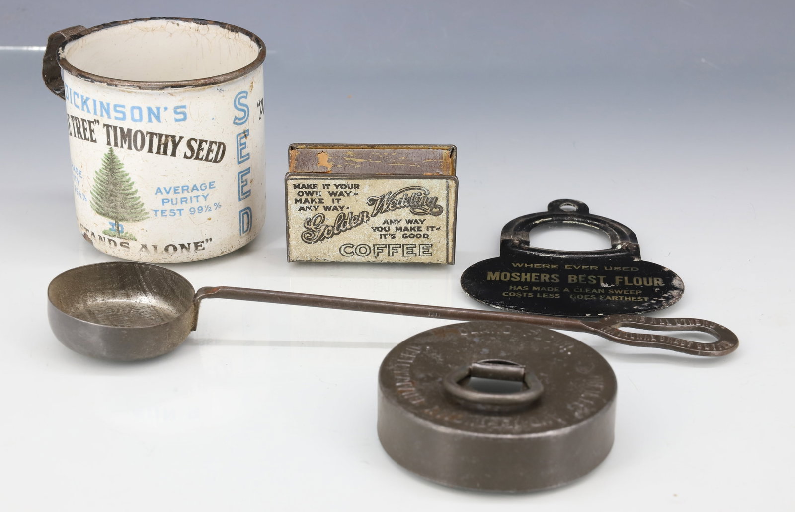 LOT OF ADVERTISING ITEMS: INCLUDING: ENAMELED MUG "DICKINSON'S PINE TREE TIMOTHY SEED". "CLARO FLOUR" BISCUIT CUTTER. CASWELL COFFEE MEASURE 8 7/8" L. "GOLDEN WEDDING" MATCHBOX HOLDER. "MOSHERS BEST FLOUR" SCRAPER. PLEASE