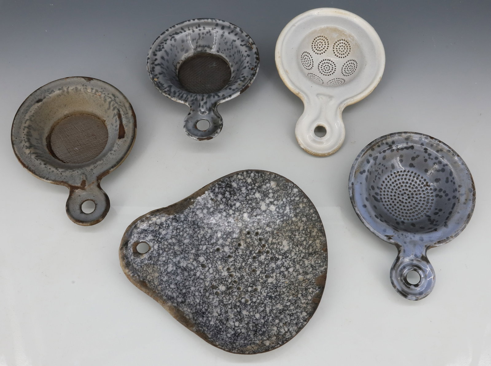 LOT OF AGATE WARE TEA STRAINERS AND SKIMMERS: SPECKLED GREY AND WHITE, MILK SKIMMER MEASURES 6 1/8" L PLEASE READ CAREFULLY - ITEMS MUST BE PAID FOR THROUGH LIVE AUCTIONEERS OR WITH CASH OR CHECK IN PERSON - Terms for Purchasing and Shipping of A