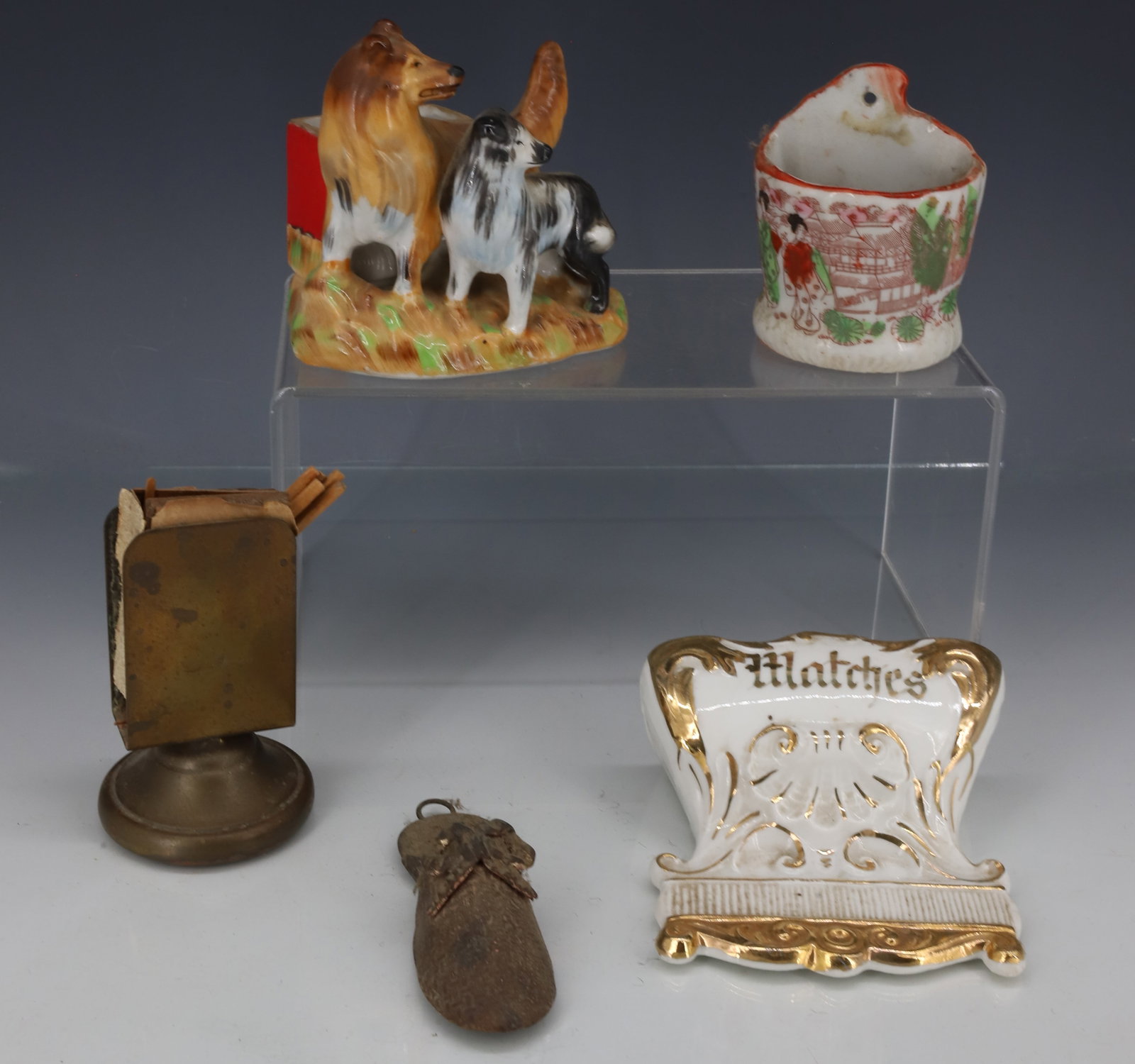 LOT OF ANTIQUE MATCH HOLDERS: PORCELAIN, BRASS, AND TIN - INCLUDING; PORCELAIN WHITE AND GOLD MARKED; GERMANY 5 1/4", ASIAN MOTIF MATCH HOLDER MARKED; JAPAN, TABLE TOP HOLDER WITH (2) DOGS MARKED; JAPAN, BRASS HOLDER MARKED; PHILA