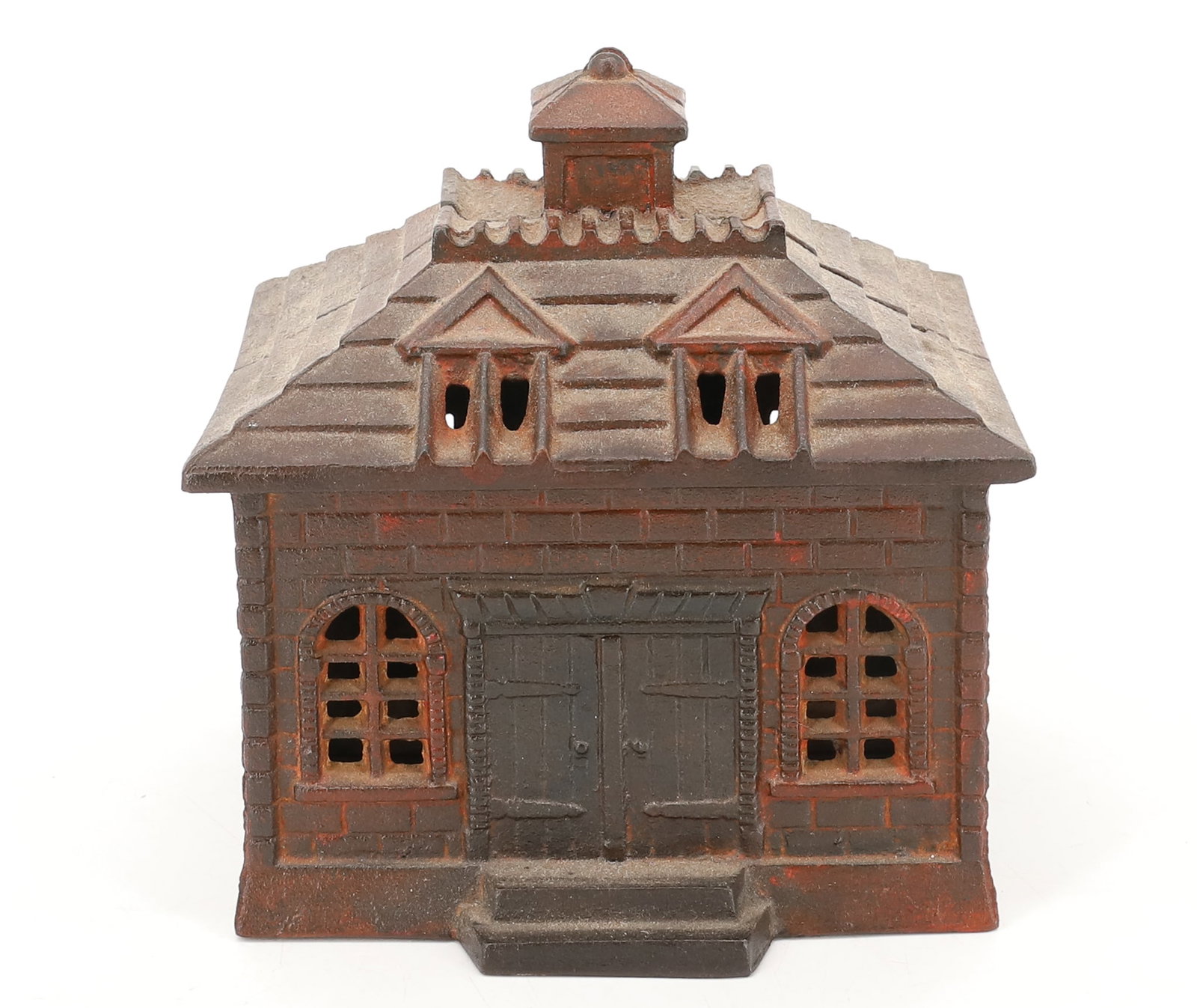 LARGE CAST IRON STILL BANK: BUILDING FORM WITH CUPOLA ON ROOF, TRACES OF RED AND BLACK PAINT, UNMARKED - 5 3/4" X 5 1/2" X 4 1/2" PLEASE READ CAREFULLY - ITEMS MUST BE PAID FOR THROUGH LIVE AUCTIONEERS OR WITH CASH OR CHECK IN P