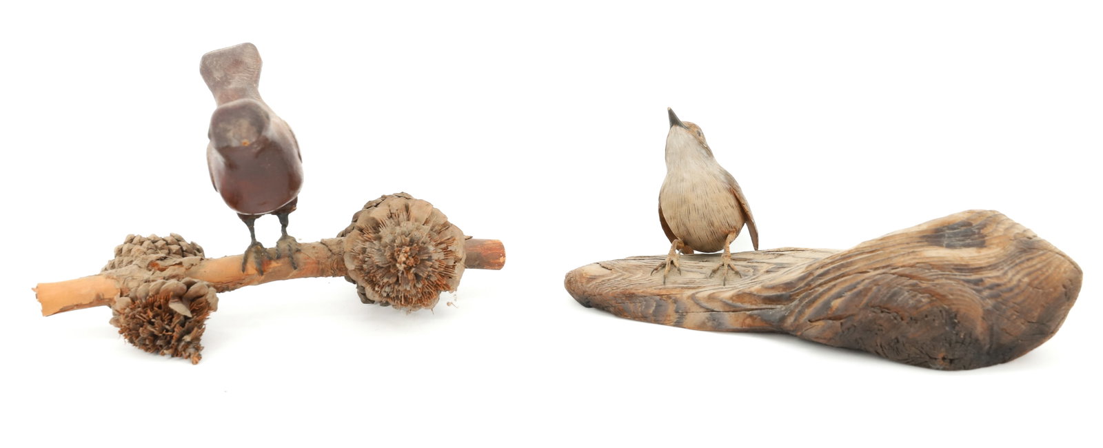 (2) CARVED WOODEN BIRDS: SMALLER BIRD MARKED; HOUSE WREN #23 BY; HOWARD PHILLIPS (8" L) - UNMARKED BIRD WITH TWIG AND PINE CONES PLEASE READ CAREFULLY - ITEMS MUST BE PAID FOR THROUGH LIVE AUCTIONEERS OR WITH CASH OR CHECK