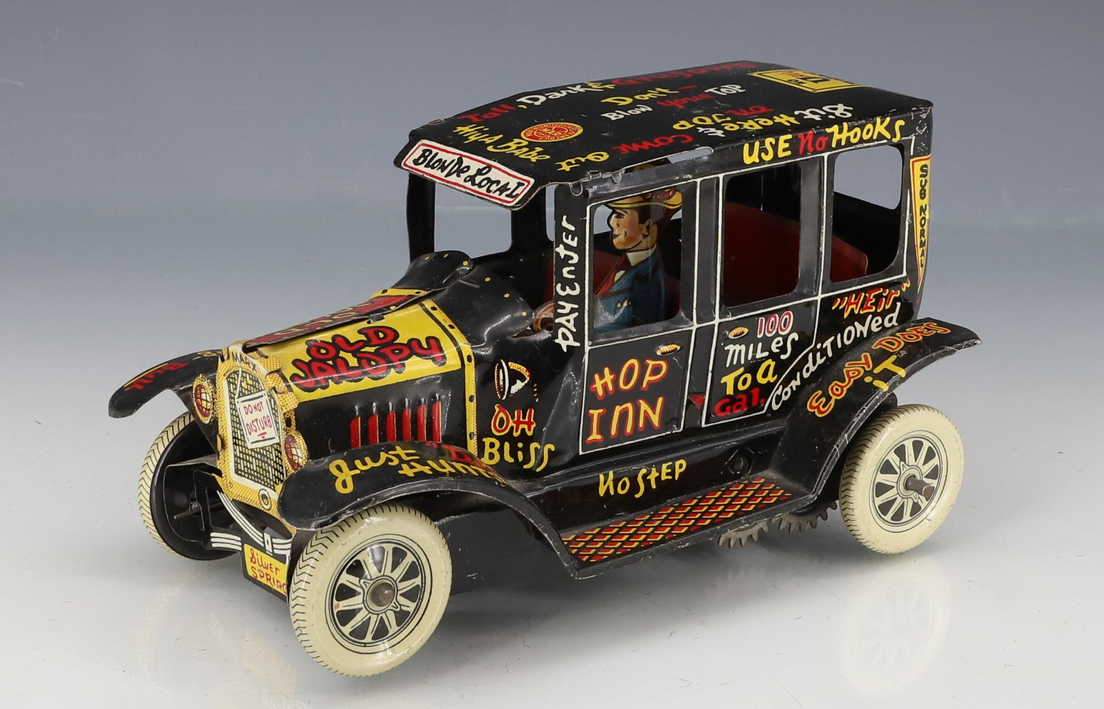 "OLD JALOPY" WINDUP CAR: MARX CO. CA. 1940S. 7" L. PLEASE READ CAREFULLY - ITEMS MUST BE PAID FOR THROUGH LIVE AUCTIONEERS OR WITH CASH OR CHECK IN PERSON - Terms for Purchasing and Shipping of Auction Items. Please read care