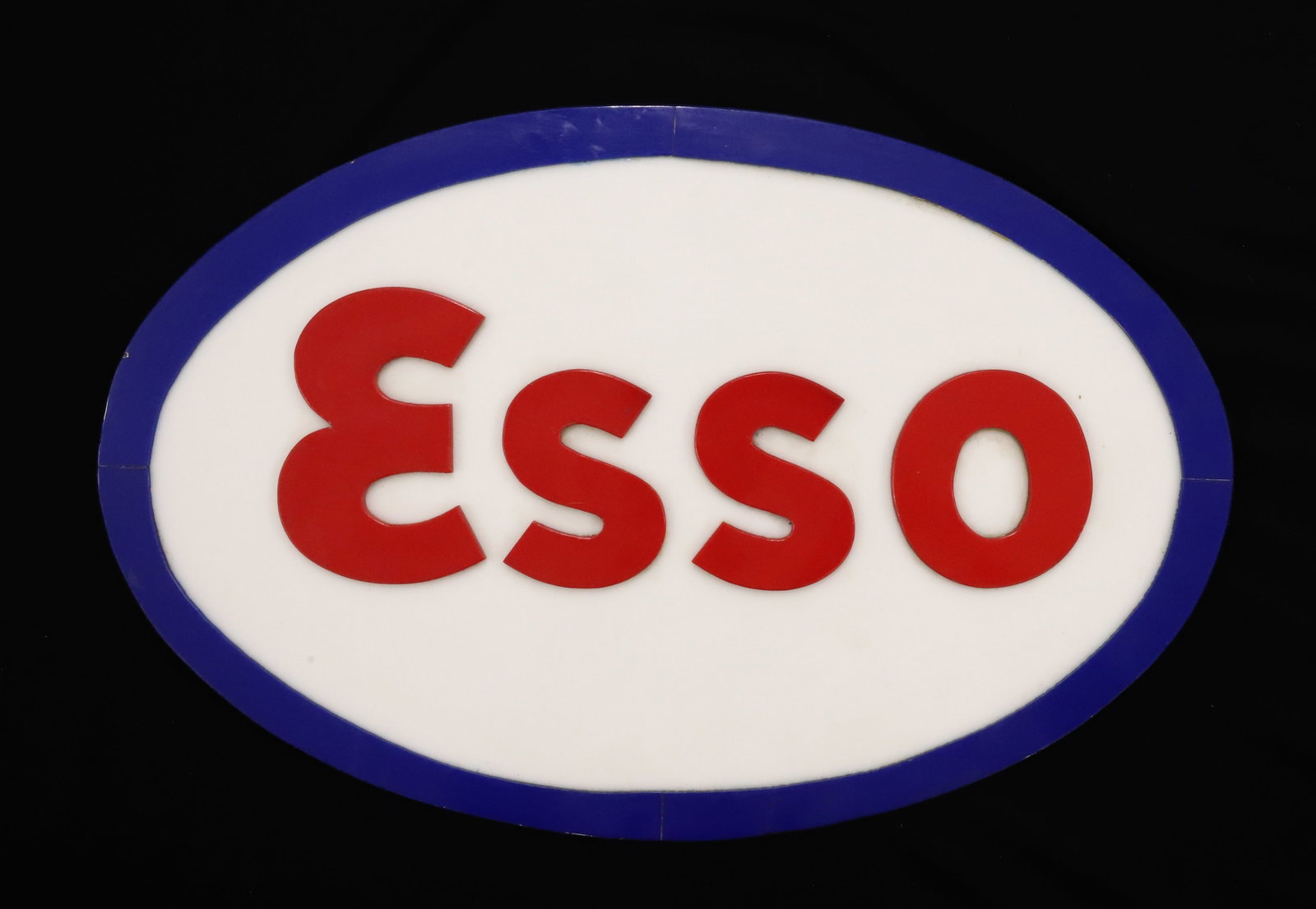 VINTAGE "ESSO" GAS SIGN: MOLDED PLASTIC WITH APPLIED LETTERS. 10" X 15 1/4". PLEASE READ CAREFULLY - ITEMS MUST BE PAID FOR THROUGH LIVE AUCTIONEERS OR WITH CASH OR CHECK IN PERSON - Terms for Purchasing and Shipping of Aucti