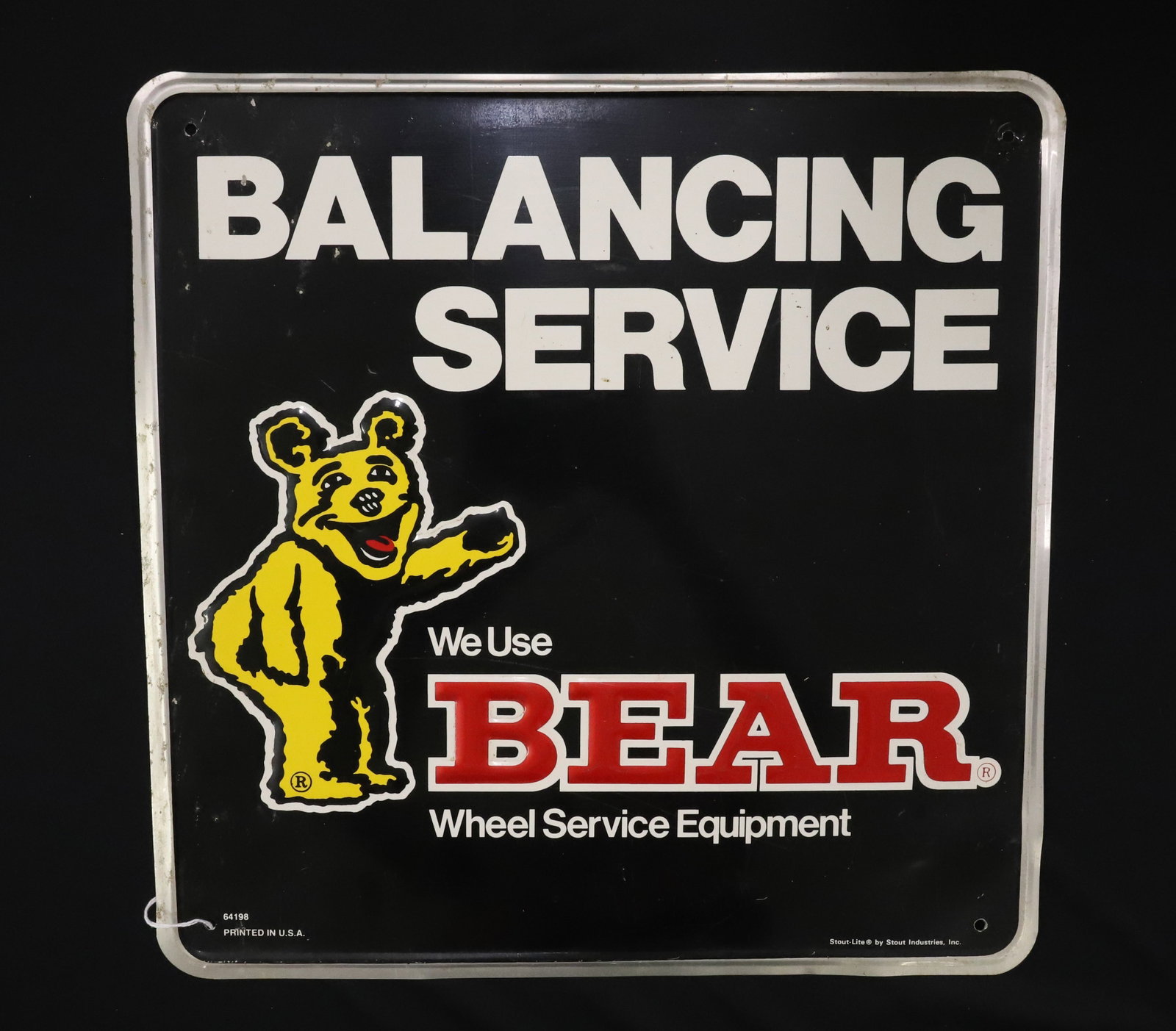 "BEAR" BALANCING SERVICE SIGN: PAINTED PRESSED ALUMINUM. (BANGOR, PA) 16" X 16". PLEASE READ CAREFULLY - ITEMS MUST BE PAID FOR THROUGH LIVE AUCTIONEERS OR WITH CASH OR CHECK IN PERSON - Terms for Purchasing and Shipping of Auction