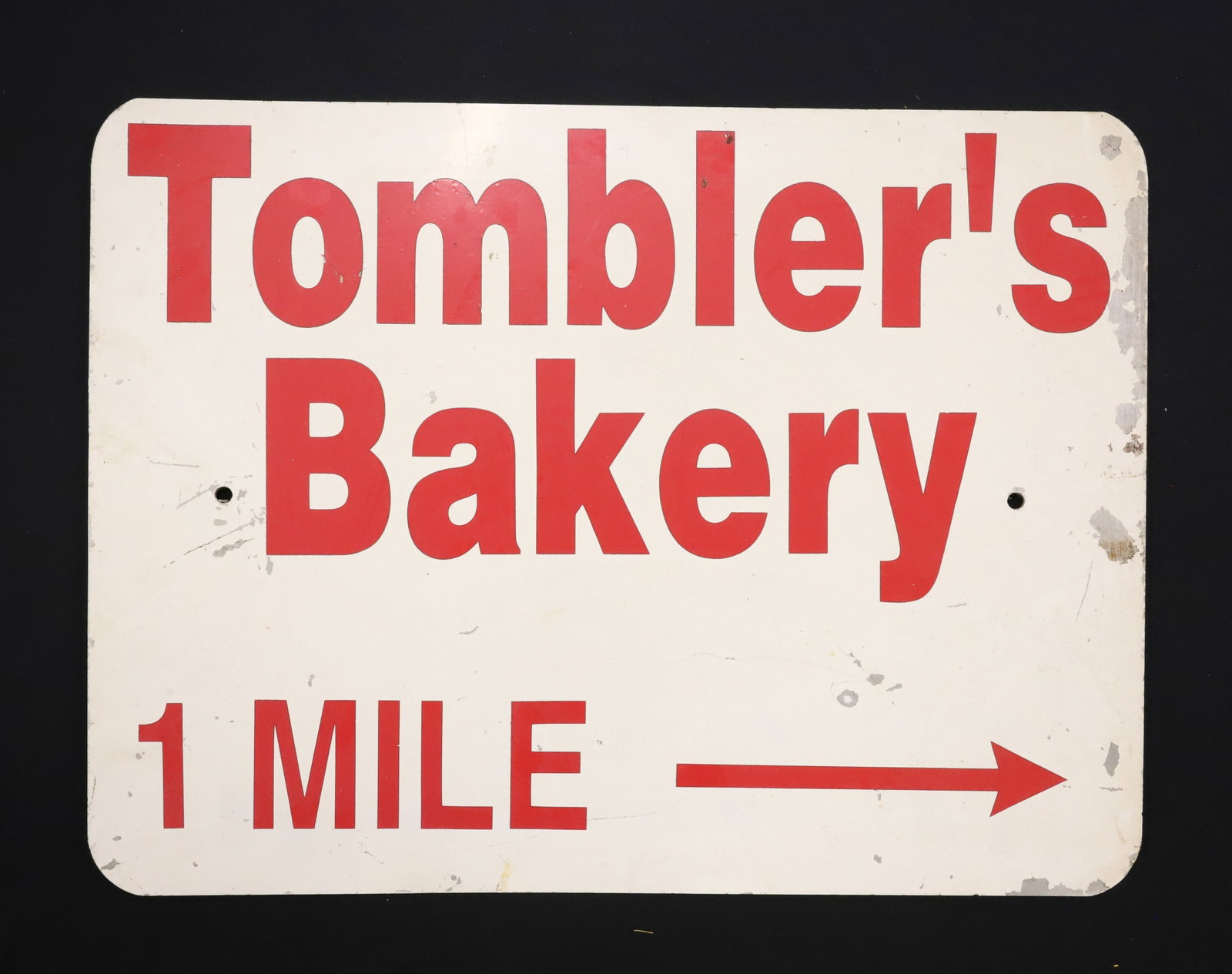 "TOMBLER'S BAKERY" ADVERTISING SIGN: PAINTED ON ROAD DIRECTIONAL SIGN. 18" X 24". PLEASE READ CAREFULLY - ITEMS MUST BE PAID FOR THROUGH LIVE AUCTIONEERS OR WITH CASH OR CHECK IN PERSON - Terms for Purchasing and Shipping of Auction Item