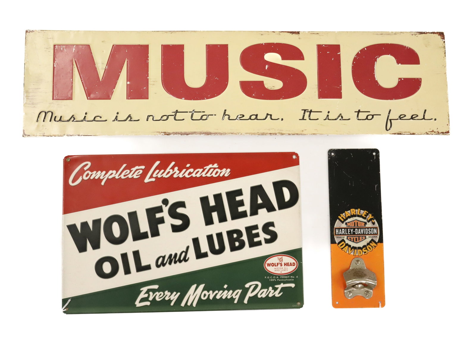LOT OF (3) DECORATIVE SIGNS: "MUSIC IS NOT TO HEAR. IT IS TO FEEL" 8" X 32" PAINTED METAL. PRINTED WOLF'S HEAD OIL AND LUBES. WITH, PAINTED METAL HARLEY-DAVIDSON BOTTLE OPENER / ADVERTISER. PLEASE READ CAREFULLY - ITEMS MUST BE P