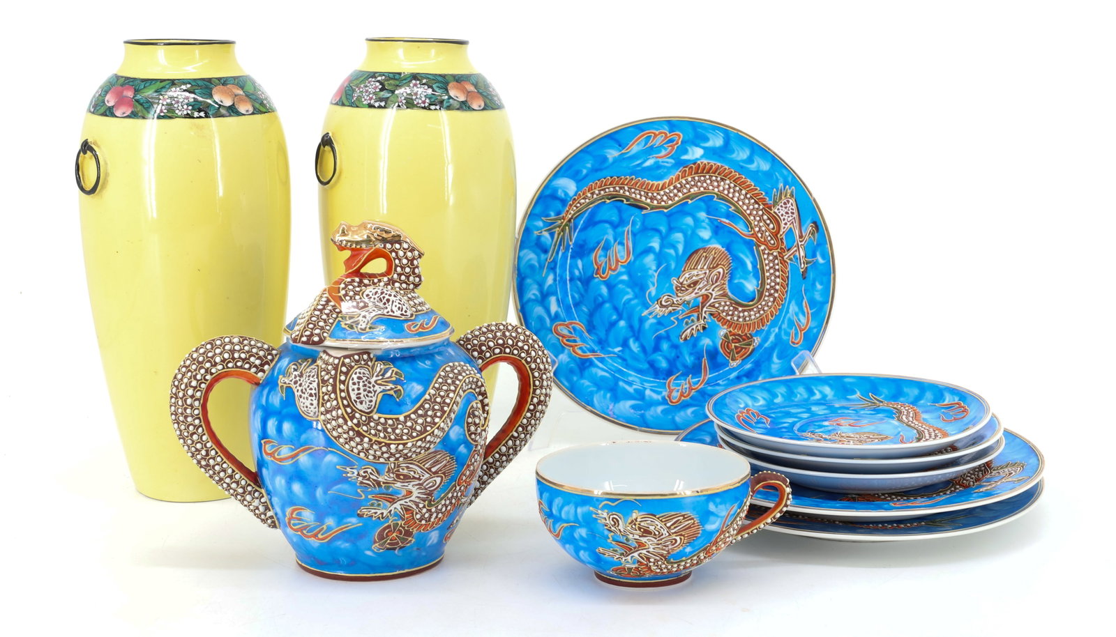 PORCELAIN VASES AND PARTIAL TEA SET: PAIR OF YELLOW "CAULDON WARE" VASES W/ FRUIT AND FLORAL BANDING. 9" H. JAPANESE TEA SET WITH ONE CUP, THREE SAUCERS, THREE PLATES AND LIDDED BOWL. CUP HAS LITHOPHANE BOTTOM (SHOWS WOMAN). PLATES 7 1/2