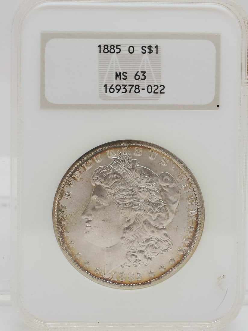 1885 O MORGAN DOLLAR: NGC GRADED MS 63 PLEASE READ CAREFULLY - PREVIEW FOR THIS AUCTION WILL BE THE DAY OF THE SALE FROM 9:00 AM TILL 1:00 PM AT THE START OF THE AUCTION - SINCE THIS IS A COIN SALE PLEASE NOTE. ITEMS MUST