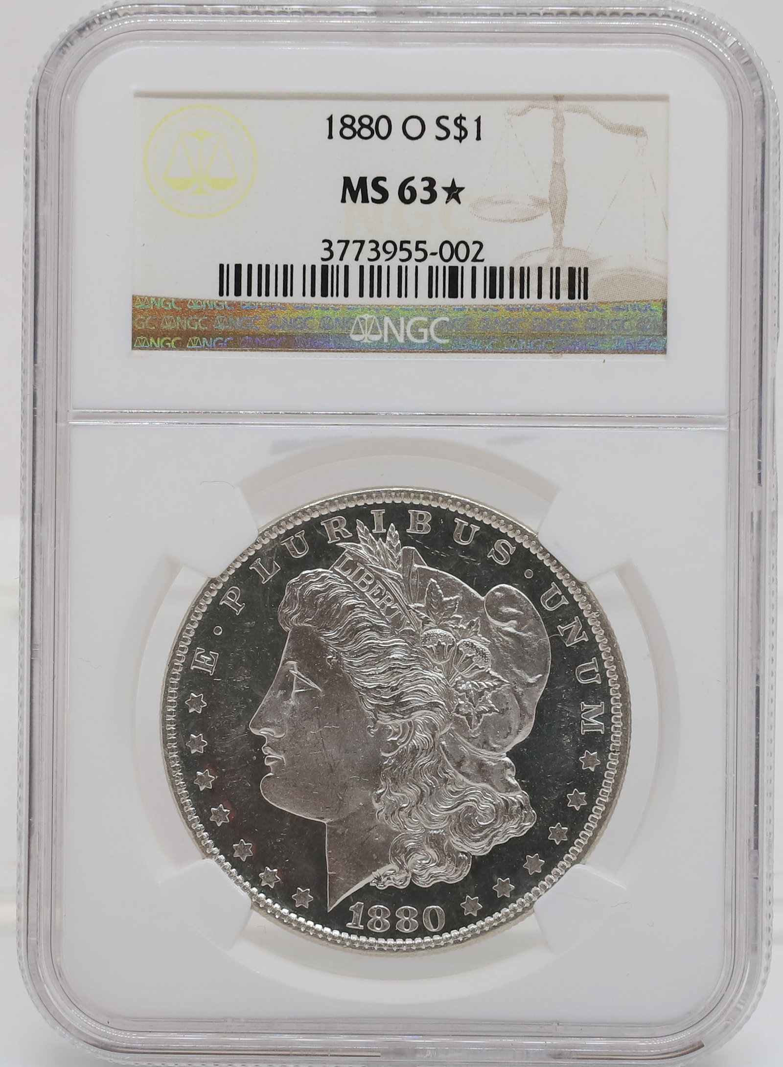 1880 O MORGAN DOLLAR: NGC GRADED MS 63 PLEASE READ CAREFULLY - PREVIEW FOR THIS AUCTION WILL BE THE DAY OF THE SALE FROM 9:00 AM TILL 1:00 PM AT THE START OF THE AUCTION - SINCE THIS IS A COIN SALE PLEASE NOTE. ITEMS MUST 