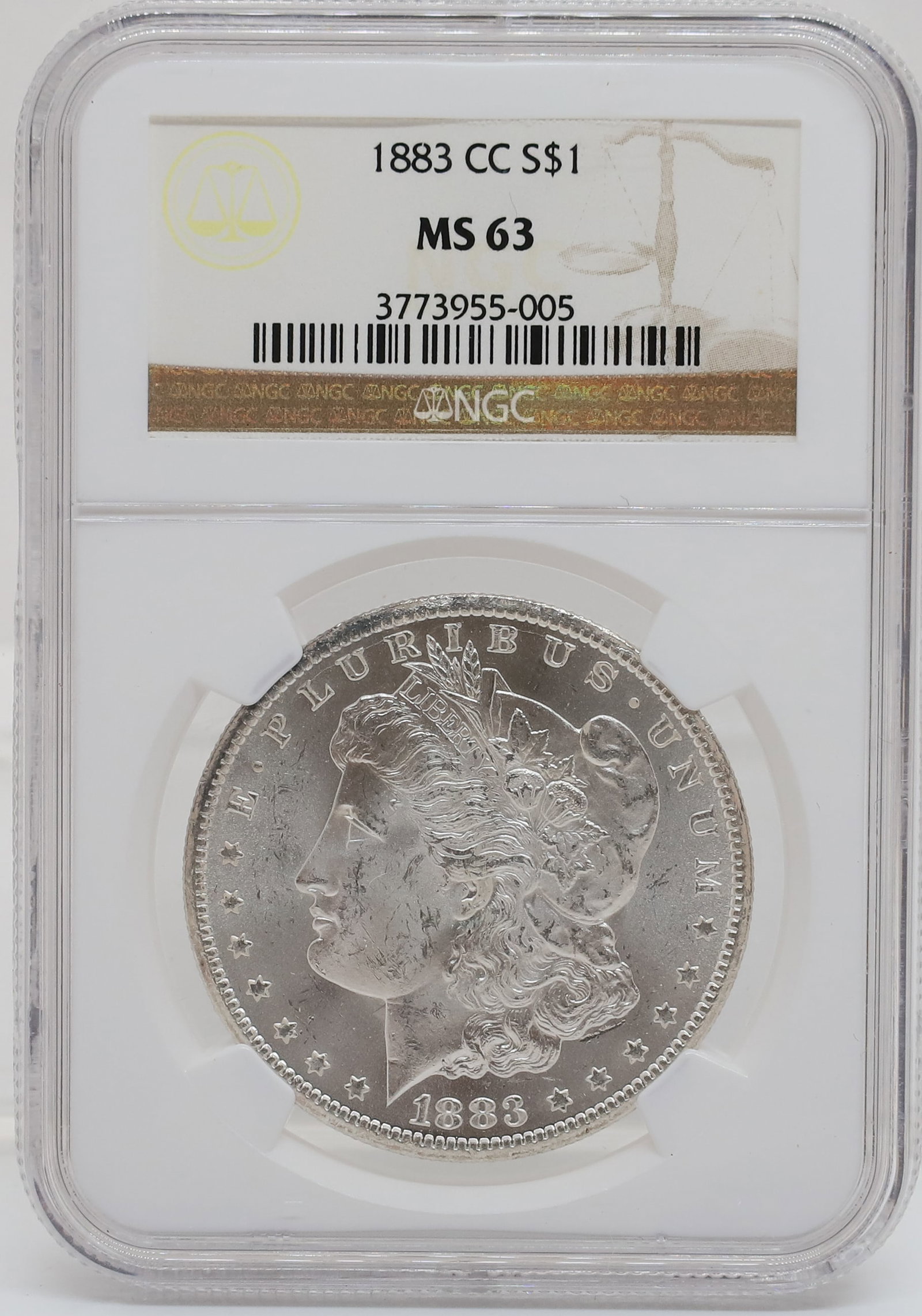 1883 CC MORGAN DOLLAR: NGC GRADED MS 63 PLEASE READ CAREFULLY - PREVIEW FOR THIS AUCTION WILL BE THE DAY OF THE SALE FROM 9:00 AM TILL 1:00 PM AT THE START OF THE AUCTION - SINCE THIS IS A COIN SALE PLEASE NOTE. ITEMS MUST