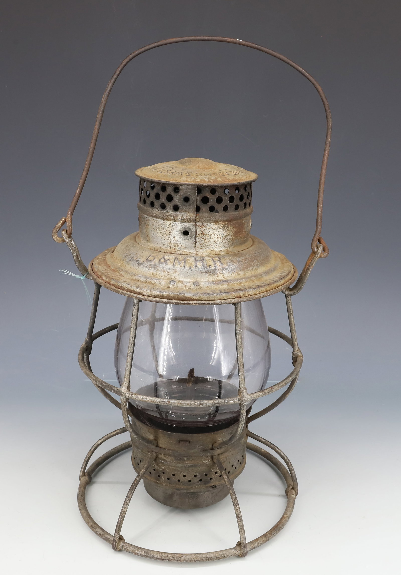 BOSTON & MAINE RAILROAD LANTERN: B&M R.R. ADLAKE LANTERN WITH GLASS GLOBE. 10" H. PLEASE READ CAREFULLY - ITEMS MUST BE PAID FOR THROUGH LIVE AUCTIONEERS OR WITH CASH OR CHECK IN PERSON - Terms for Purchasing and Shipping of Auction