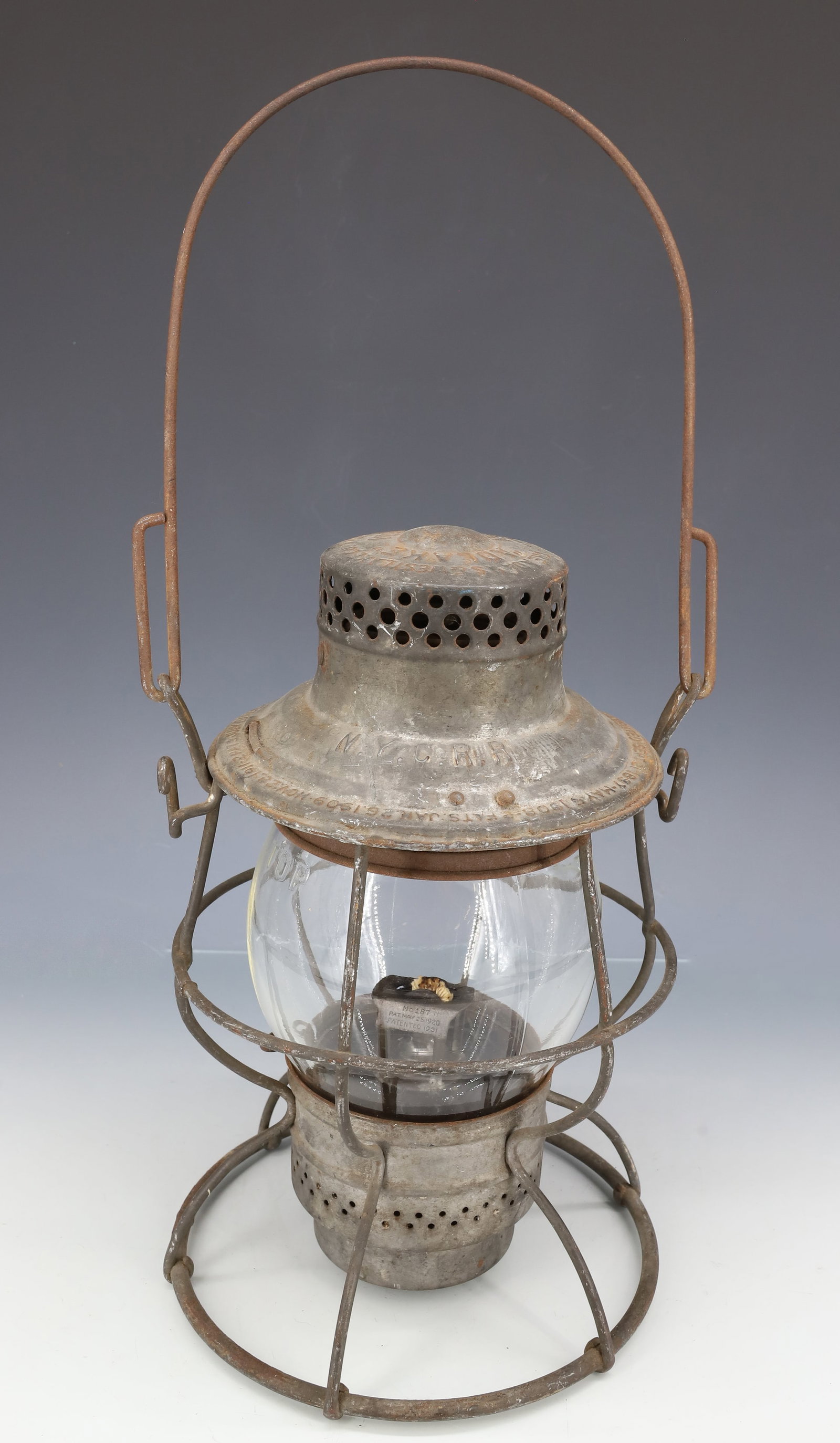 NEW YORK CENTRAL RAILROAD LANTERN: N.Y.C.R.R. ADLAKE NO. 100. 10 1/4" H. GLOBE MRKD. MADE IN USA. PLEASE READ CAREFULLY - ITEMS MUST BE PAID FOR THROUGH LIVE AUCTIONEERS OR WITH CASH OR CHECK IN PERSON - Terms for Purchasing and