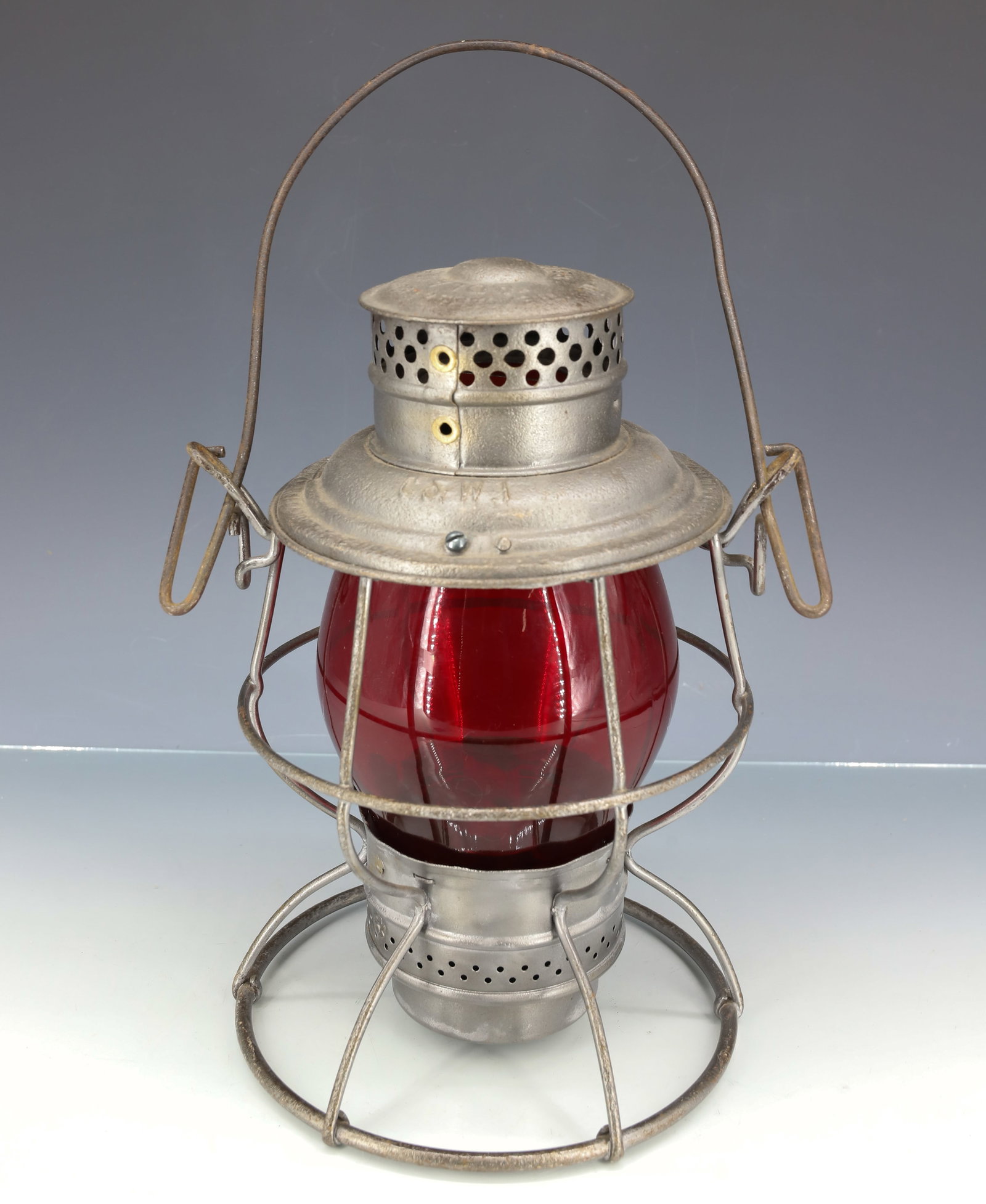 CHICAGO AND WESTERN INDIANA RAILROAD LANTERN: C & W.I ADLAKE RELIABLE WITH RED GLOBE. 10 1/4" H. PLEASE READ CAREFULLY - ITEMS MUST BE PAID FOR THROUGH LIVE AUCTIONEERS OR WITH CASH OR CHECK IN PERSON - Terms for Purchasing and Shipping of Auctio