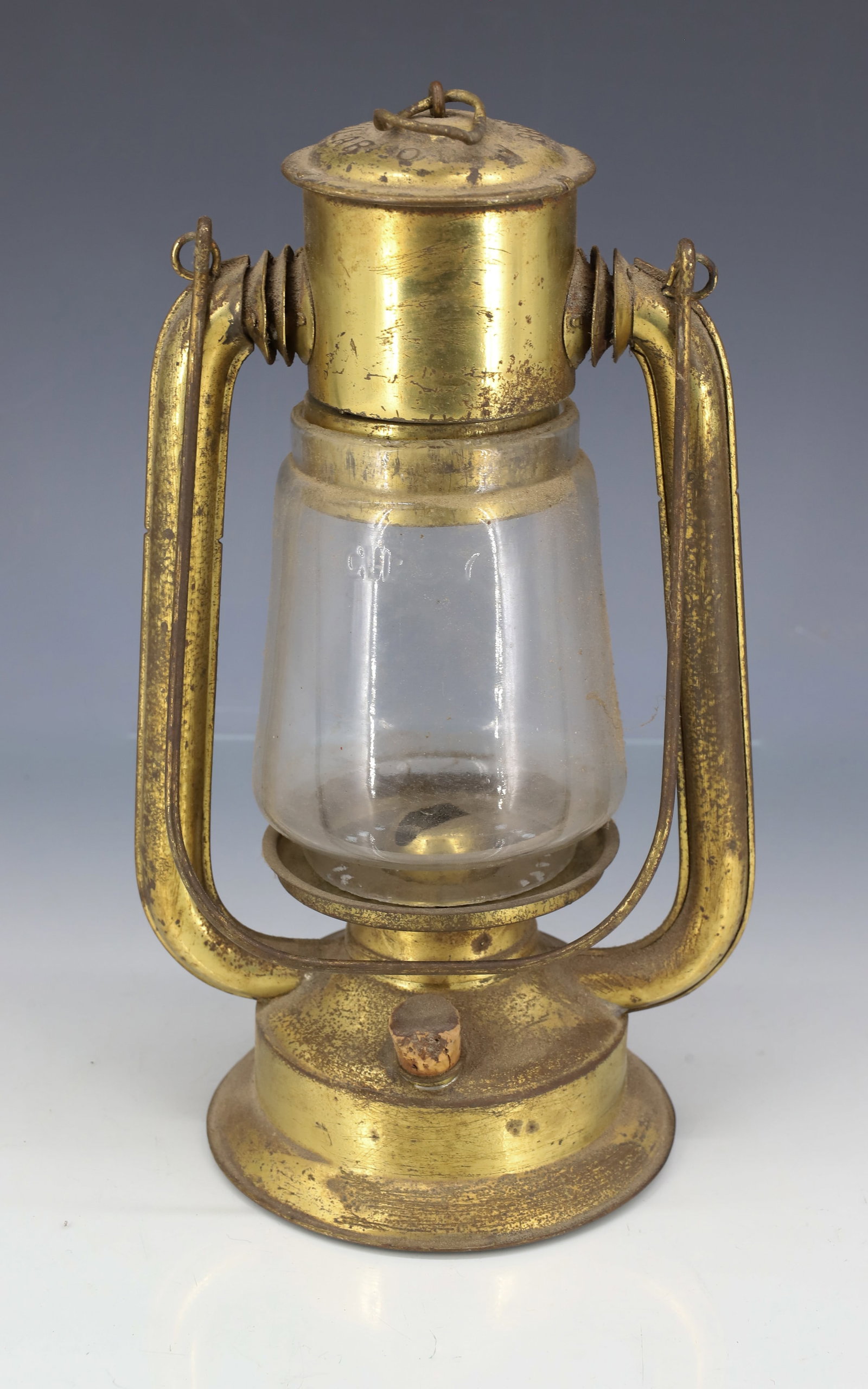 BRASS TUBULAR KEROSENE LAMP: CLEAR GLOBE EMBOSSED "GIPSY". 9" H. PLEASE READ CAREFULLY - ITEMS MUST BE PAID FOR THROUGH LIVE AUCTIONEERS OR WITH CASH OR CHECK IN PERSON - Terms for Purchasing and Shipping of Auction Items.
