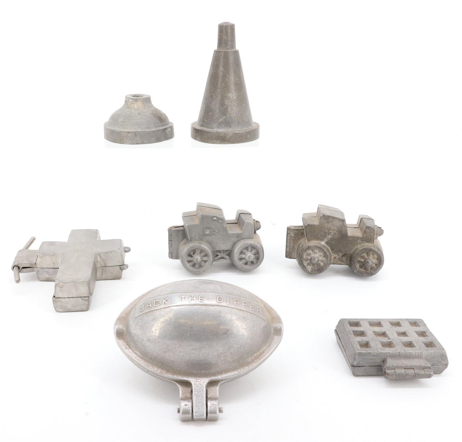 LOT OF (6) ICE CREAM MOLDS, CHOCOLATE: INCLUDING: (2) OPEN CARS (MRKD. S&CO. 562). CROSS (MRKD. E& CO. NY 1005) 4 1/2" H. WAFFLE. FOOTBALL MRKD. JACK THE DIPPER 4 1/2" L. TWO PIECE CONE #219. PLEASE READ CAREFULLY - ITEMS MUST BE PAID FOR 