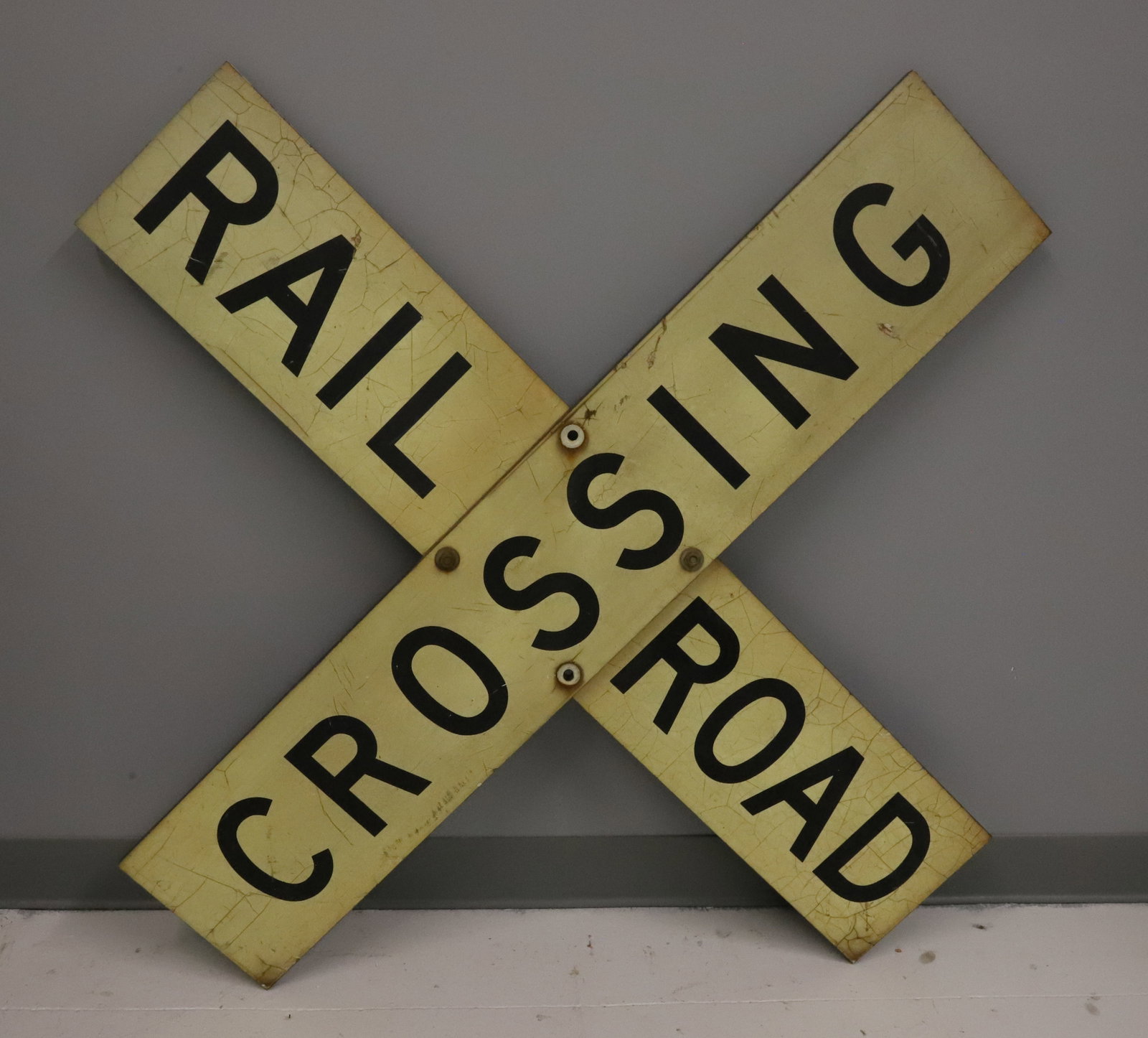 RAILROAD CROSSING SIGN: PAINTED ON ALUMINUM. 48" X 48". PLEASE READ CAREFULLY - ITEMS MUST BE PAID FOR THROUGH LIVE AUCTIONEERS OR WITH CASH OR CHECK IN PERSON - Terms for Purchasing and Shipping of Auction Items. Please rea