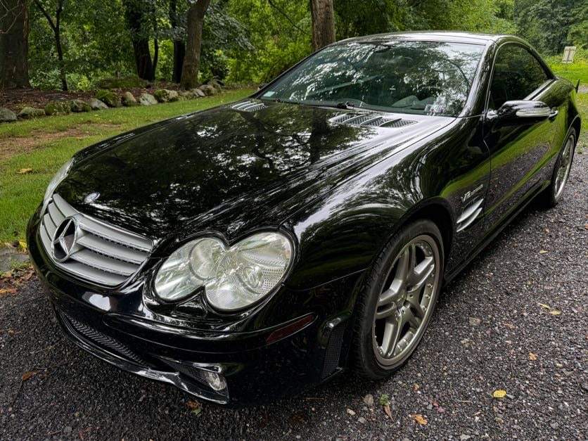 2005 MERCEDES BENZ AMG SL 65: 47,091 MILES, VIN# WDBSK79F25F098325, V12 TURBOCHARGED WITH 6.0 TWIN TURBOS, RENNTECH ECY CHIP WITH 670 HP, CARBON FIBER PACKAGE, 5 SPEED AUTOMATIC TRANSMISSION, LEATHER INTERIOR, AND CONVERTIBLE HARD