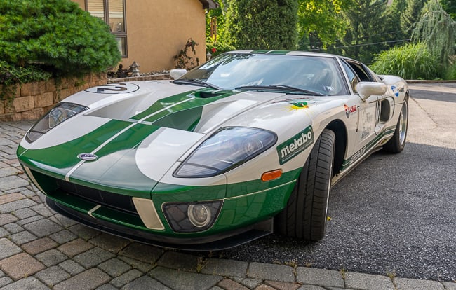 2005 FORD GT: 12,085 MILES, VIN# 1FAP90S65Y401465, 5.4L SUPERCHARGED V8 WITH PERFORMANCE UPGRADED CHIP TO 710HP, 6 SPEED MANUAL TRANSMISSION, REAR WHEEL DRIVE, WHITE OVER GRAY INTERIOR LEATHER, WITH FREE AND CLEAR 
