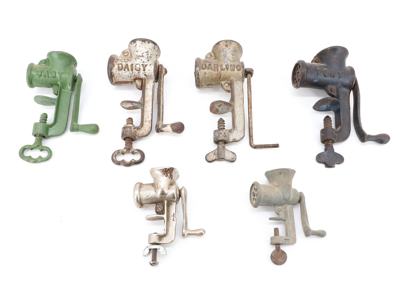 LOT OF (6) TOY / MINIATURE MEAT GRINDERS: INCLUDING: DARLING, DAISY, BABY AND PONY. SOME PAINTED. 2 1/2" TO 4 1/2". PLEASE READ CAREFULLY - ITEMS MUST BE PAID FOR THROUGH LIVE AUCTIONEERS OR WITH CASH OR CHECK IN PERSON - Terms for