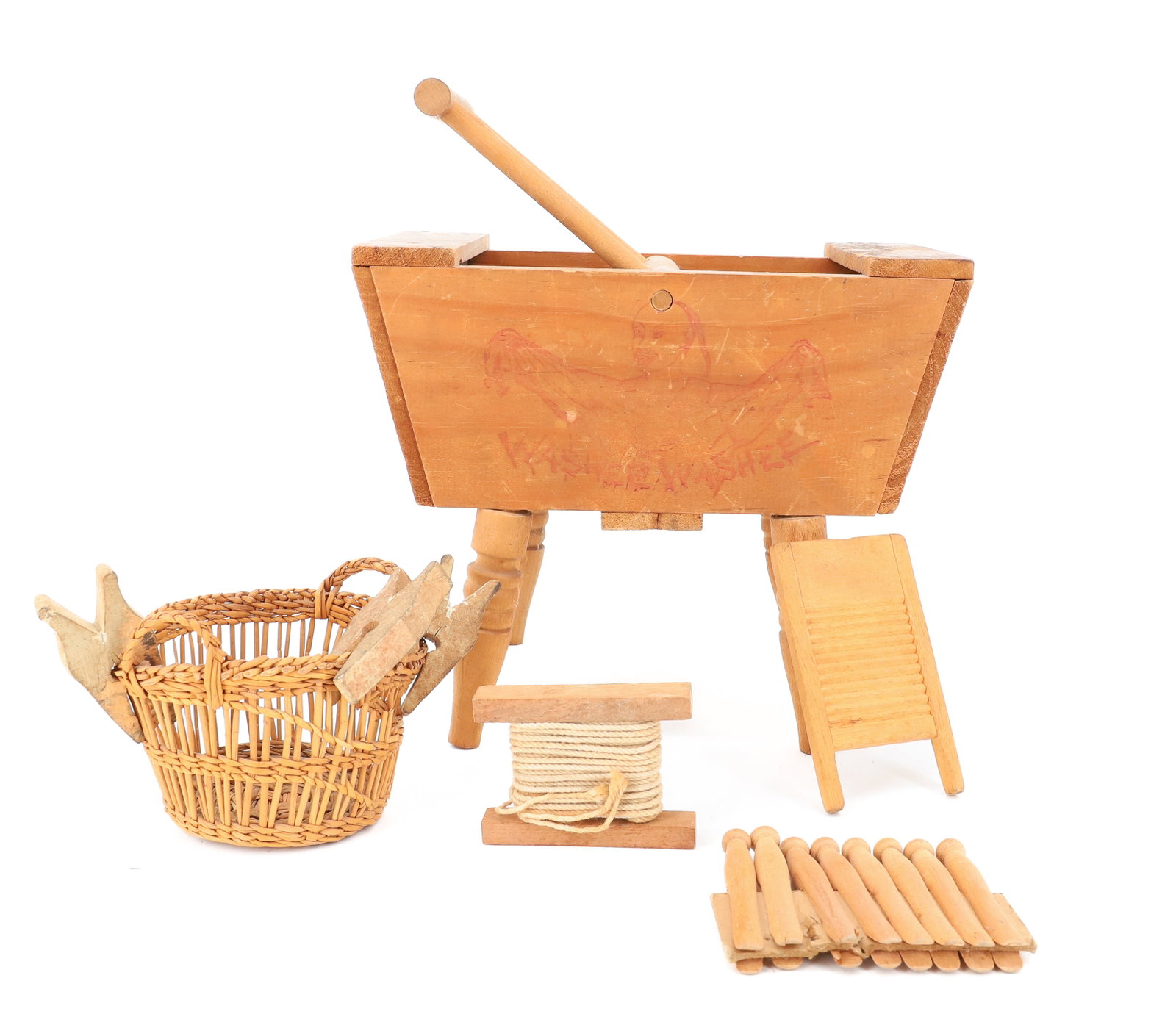 CHILD'S WOODEN WASHING MACHINE AND MORE: WOODEN MRKD. "WASHEE WASHEE" ON EITHER SIDE. LINED WITH METAL. 7" X 8" X 4 3/4". WITH, WASH BASKET, WOODEN CLOTHES PINS, MINI WASHBOARD AND MORE. PLEASE READ CAREFULLY - ITEMS MUST BE PAID FOR