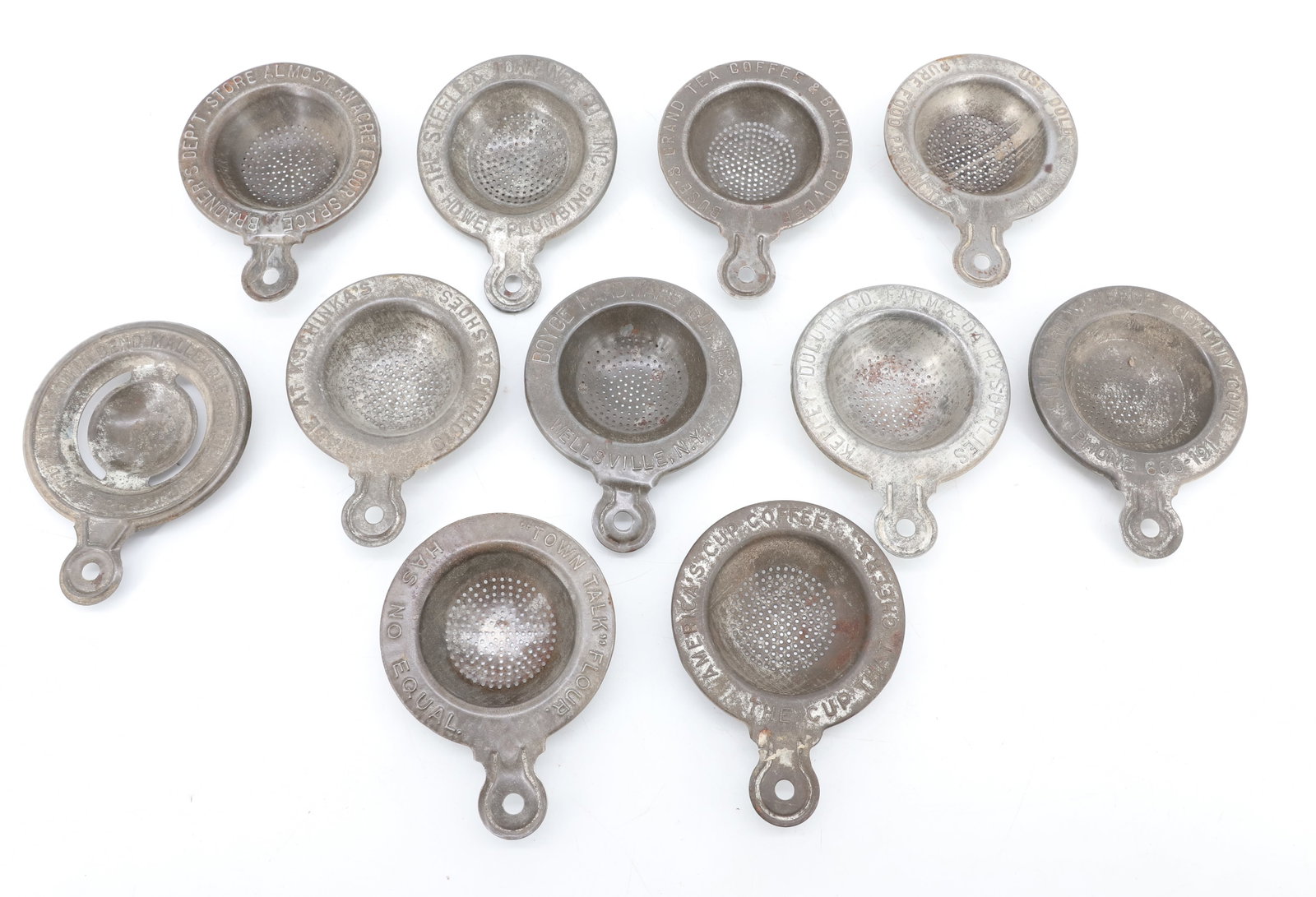 LOT OF TIN ADVERTISING TEA STRAINERS (1 of 4)