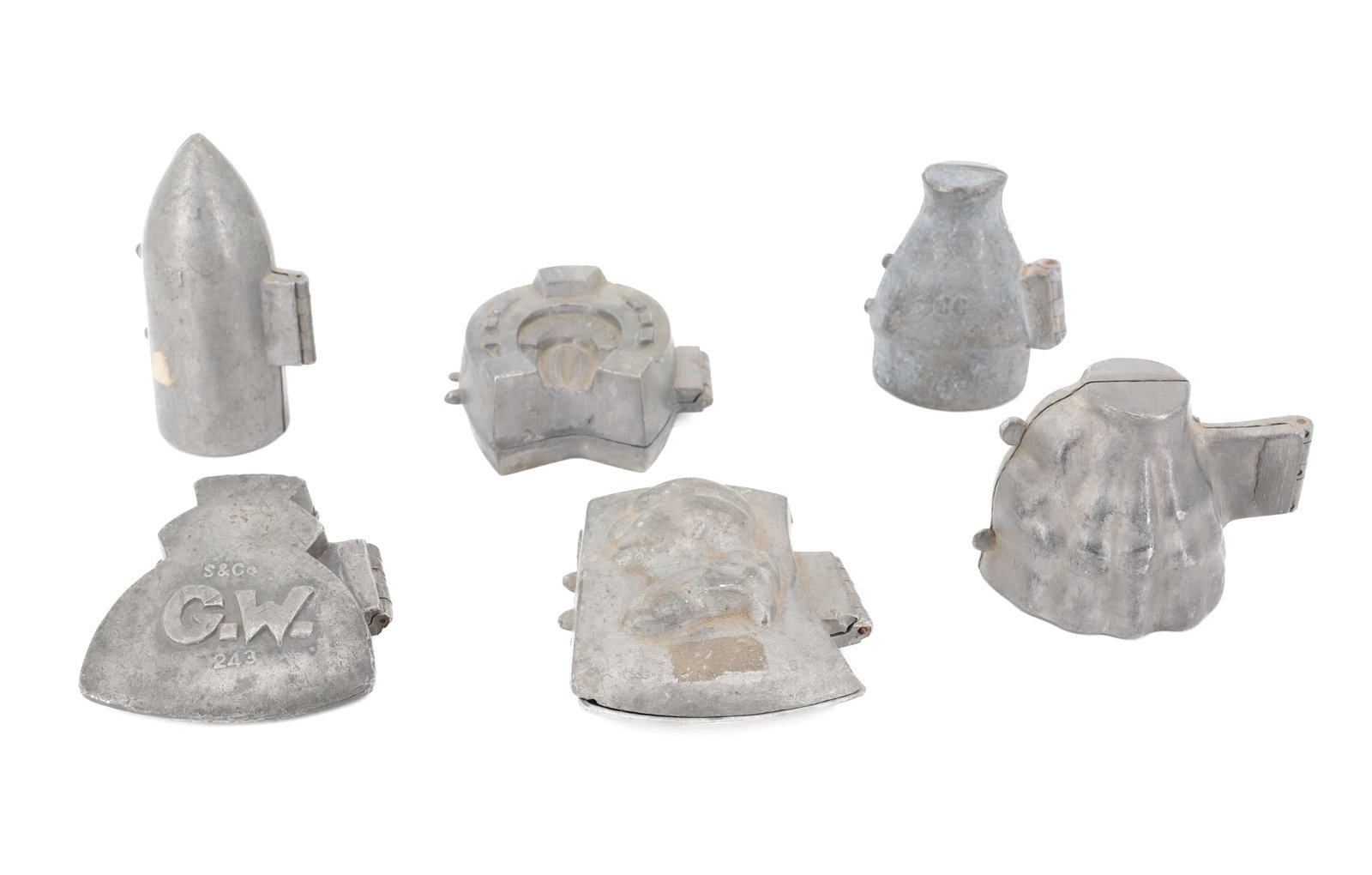 LOT OF (6) PEWTER ICE CREAM MOLDS, CHOCOLATE: INCLUDING: GEORGE WASHING/AXE 4" X 3". "G.W." ON AXE BY S&CO. 243. MILITARY SHELL MRKD. S&CO. 521. "GOOD LUCK" HORSESHOE MRKD. S&CO. 183. COTTAGE W/ THATCHED ROOF MRKD. CC AND ON HINGE. PLUS, ONE MORE