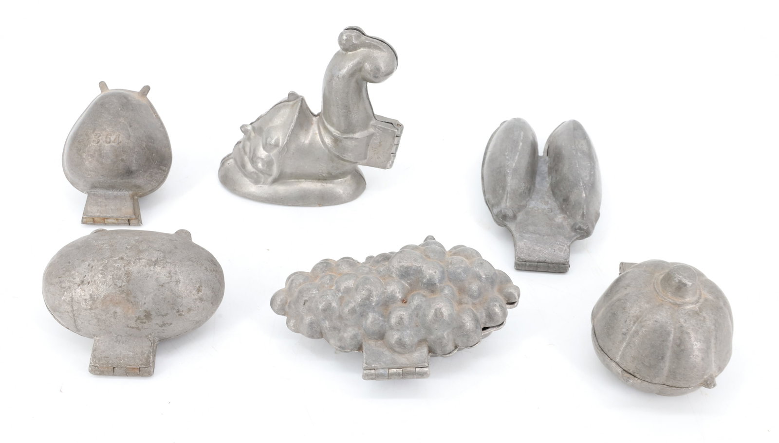 LOT OF (6) PEWTER ICE CREAM MOLDS, CHOCOLATE: INCLUDING: CORNUCOPIA MRKD. 287 (4 1/2" X 4 3/4"). PUMPKIN MRKD. S&CO. 600. STRAWBERRY MRKD. 364. POTATO 3 1/2" L. BUNCH OF GRAPES 691. PEAPODS MRKD. E&CO. NY. PAT APD FOR. PLEASE READ CAREFULLY - ITE