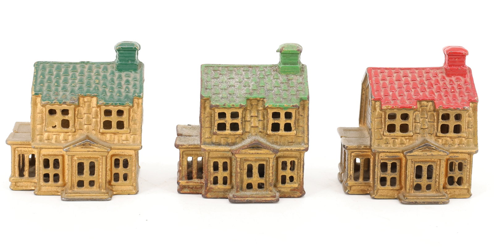 (3) CAST IRON HOUSE BANKS: THREE TWO-STORY HOUSES WITH DORMERS. GOLD / RED / GREEN PAINT. 3" X 2 1/2" X 2 1/4". PLEASE READ CAREFULLY - ITEMS MUST BE PAID FOR THROUGH LIVE AUCTIONEERS OR WITH CASH OR CHECK IN PERSON - Terms