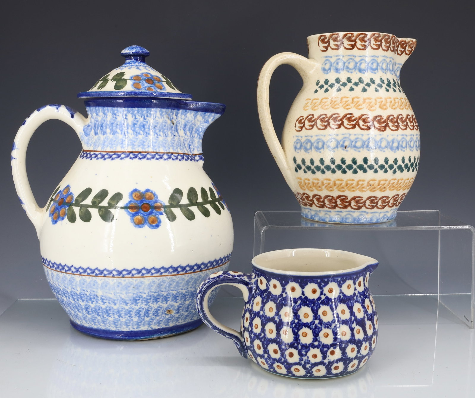 LOT OF DECORATED POTTERY PITCHERS (1 of 8)