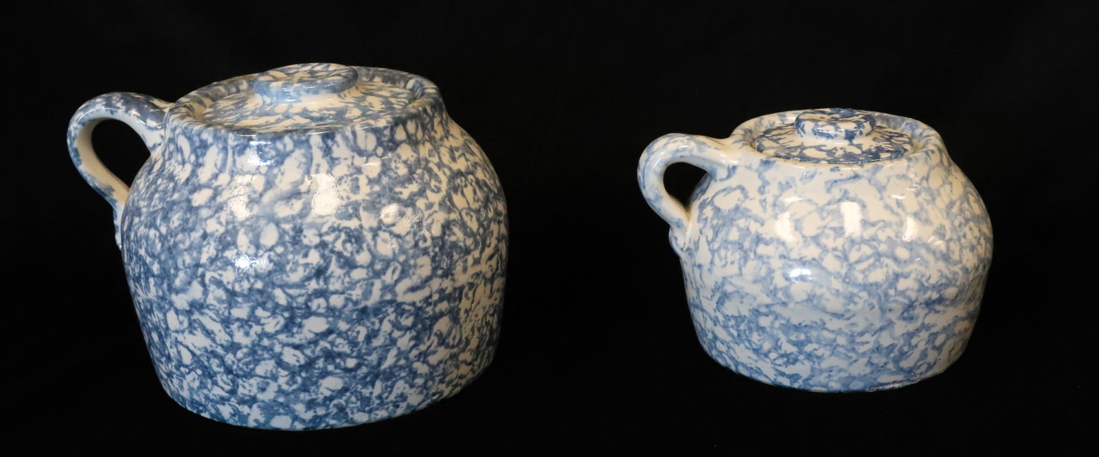 (2) BLUE / WHITE SPONGEWARE BEAN POTS: SIDE HANDLES AND LIDS. 4 1/2" AND 5 3/4" HEIGHTS. PLEASE READ CAREFULLY - ITEMS MUST BE PAID FOR THROUGH LIVE AUCTIONEERS OR WITH CASH OR CHECK IN PERSON - Terms for Purchasing and Shipping of Auction