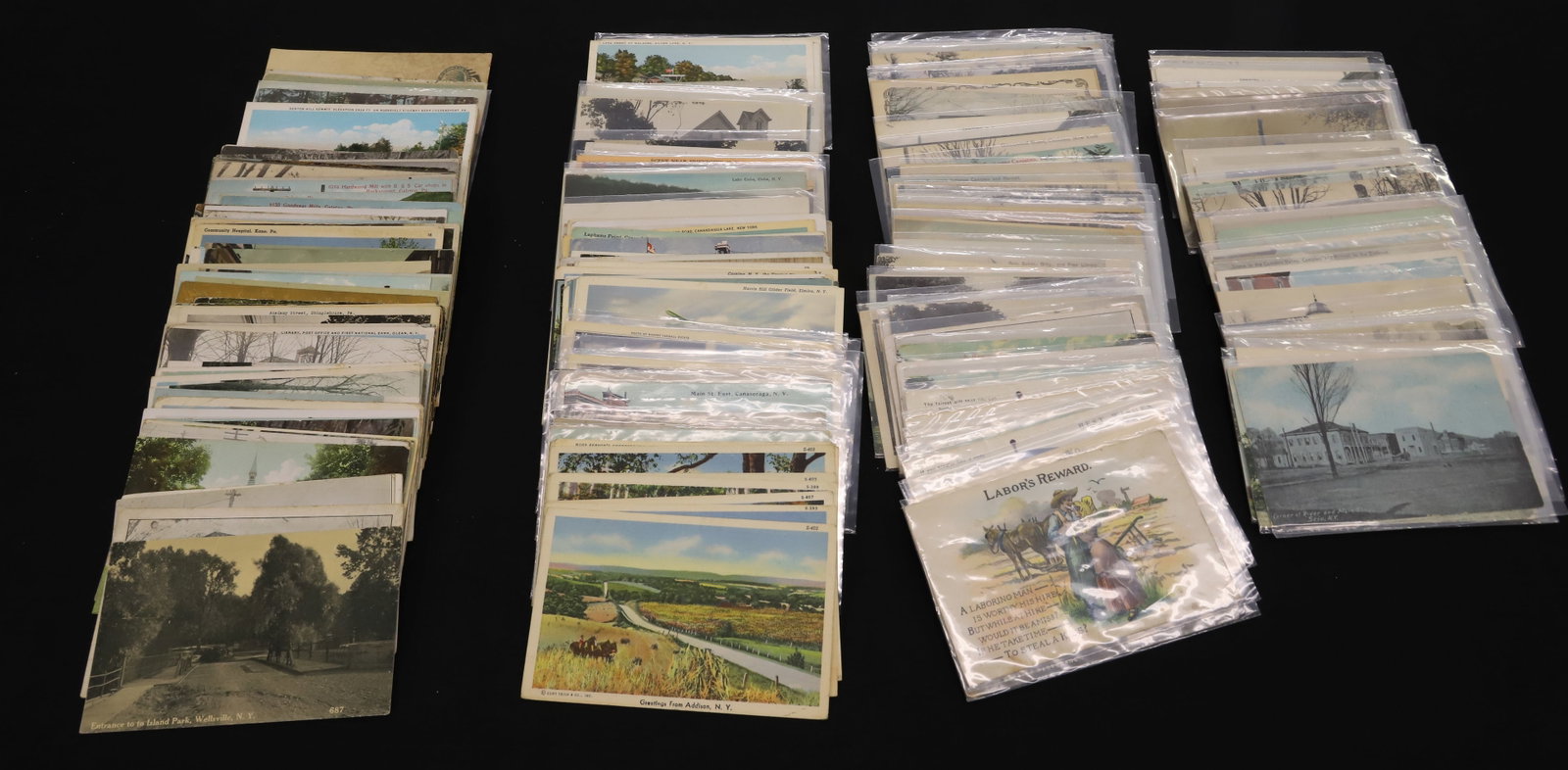 LOT OF (125+) NY STATE POSTCARDS: VARIETY OF TOWNS AND IMAGES. INCLUDING: CORNING, ELMIRA, SILVERLAKE, BELFAST, CANISTEO, ADDISON, SCIO, GREENWOOD, AND MORE. PLEASE READ CAREFULLY - ITEMS MUST BE PAID FOR THROUGH LIVE AUCTIONEERS OR W