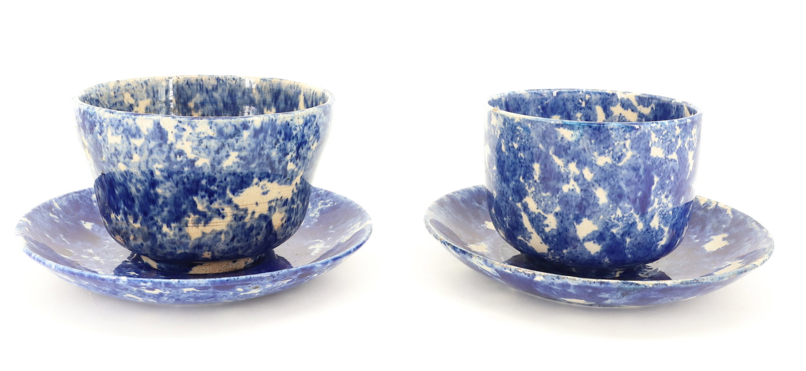 BLUE / WHITE SPONGEWARE MUSH CUPS: OVERSIZED CUPS WITH SAUCERS. 4" H. SAUCERS 8 3/8"D. PLEASE READ CAREFULLY - ITEMS MUST BE PAID FOR THROUGH LIVE AUCTIONEERS OR WITH CASH OR CHECK IN PERSON - Terms for Purchasing and Shipping of Aucti