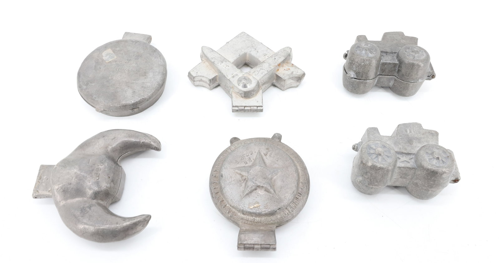 LOT OF (6) PEWTER ICE CREAM MOLDS, CHOCOLATE: INCLUDING: TWO OPEN-AIR CARS (MRKD. S&CO. 562) 3 3/4" L. MASON'S SYMBOL (323). SHRINER SYMBOL (E&CO. NY 1081). AMERICAN LEGION (E&CO. NY 1119). KIWANIS CLUB (E&CO. NY 1111). PLEASE READ CAREFULLY - IT