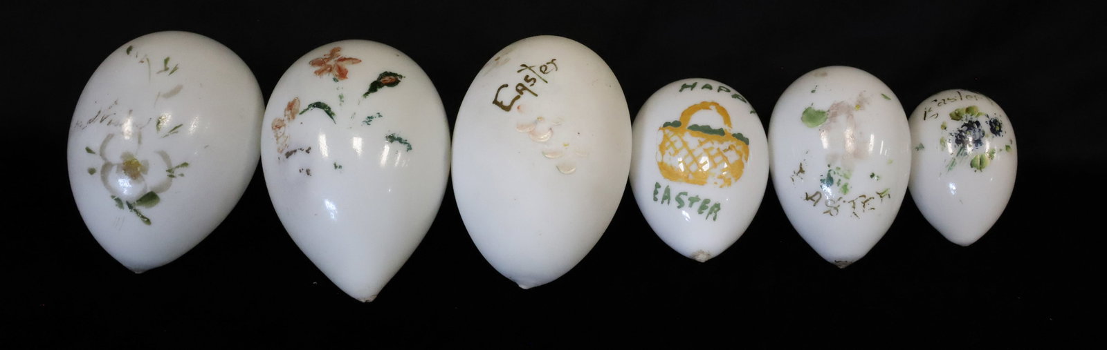 (6) BLOWN GLASS EASTER EGGS: WHITE MILK GLASS WITH HAND PAINTED DECORATION. 2 1/2" TO 4 1/2" LENGTH. PLEASE READ CAREFULLY - ITEMS MUST BE PAID FOR THROUGH LIVE AUCTIONEERS OR WITH CASH OR CHECK IN PERSON - Terms for Purchasing