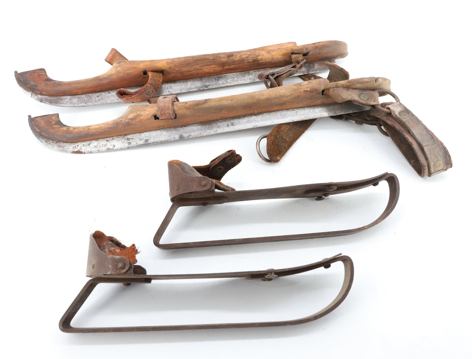 (2) PAIRS OF ANTIQUE ICE SKATES. ONE PAIR OF IRON AND THE OTHER IRON AND WOOD 16" L. (1 of 4)