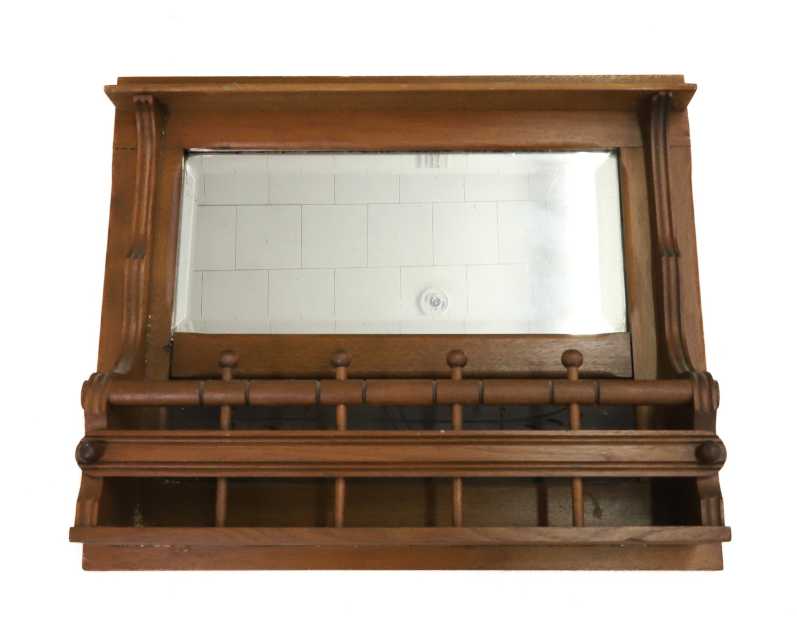 VICTORIAN EASTLAKE WALL MIRROR / SHELF: BEVELED MIRROR BACK OVER SHELF W/ RAIL. SPOON CARVED DECORATION. 19 1/2" X 23 1/4". PLEASE READ CAREFULLY - ITEMS MUST BE PAID FOR THROUGH LIVE AUCTIONEERS OR WITH CASH OR CHECK IN PERSON - Terms for 