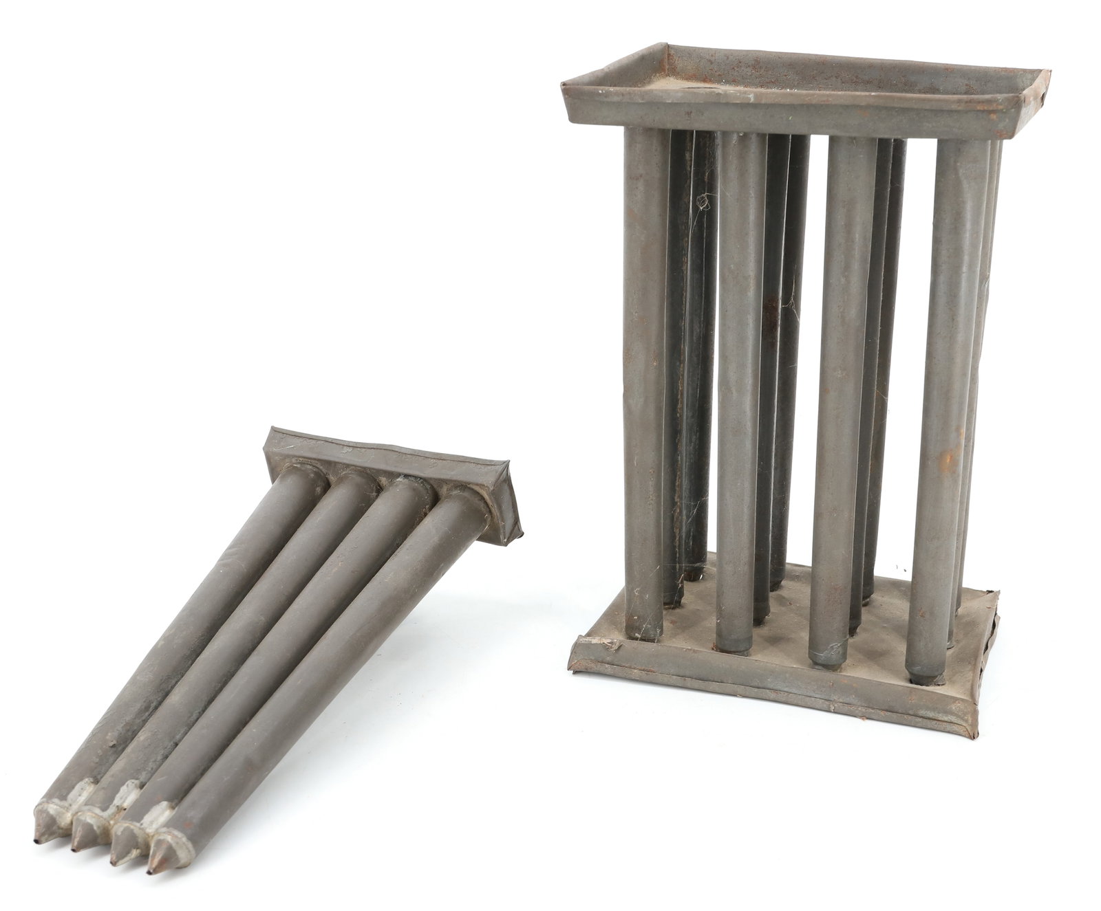 (2) ANTIQUE TIN CANDLE MOLDS: FOUR-HOLE MOLD WITH ANGLED TUBES. 10 1/2" L. WITH, TWELVE-HOLE MOLD. 10 1/2" X 7 1/2" X 5 1/4". PLEASE READ CAREFULLY - ITEMS MUST BE PAID FOR THROUGH LIVE AUCTIONEERS OR WITH CASH OR CHECK IN PERSON