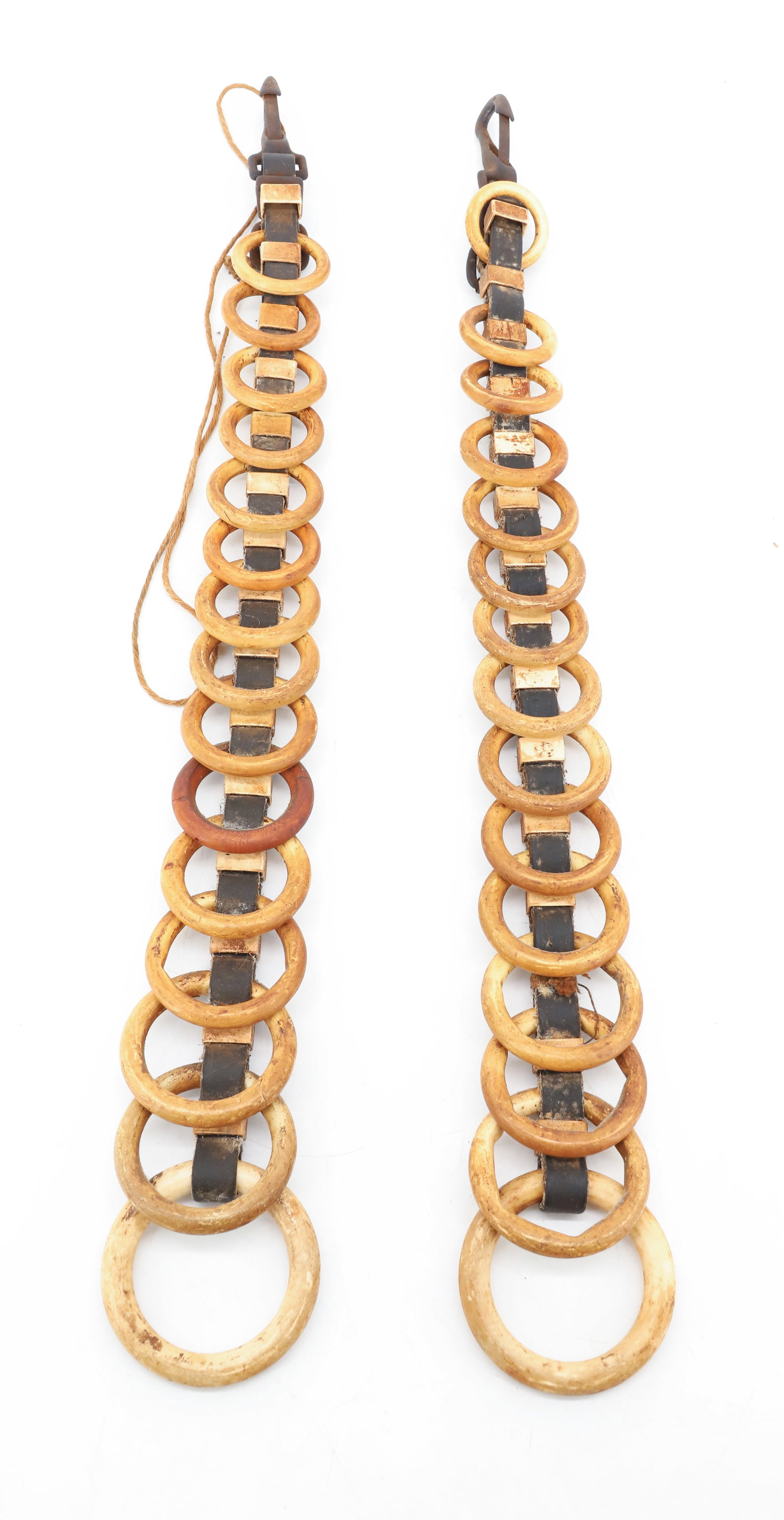 (2) HORSE HARNESS REIN SEPARATORS: GRADUATED RINGS ON LEATHER STRAPPING. 23" L. PLEASE READ CAREFULLY - ITEMS MUST BE PAID FOR THROUGH LIVE AUCTIONEERS OR WITH CASH OR CHECK IN PERSON - Terms for Purchasing and Shipping of Auction