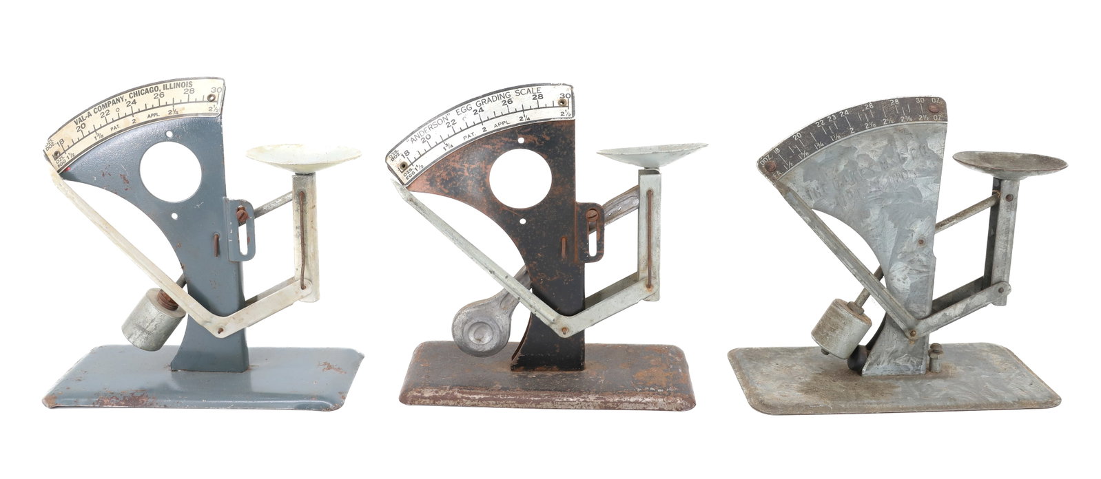 (3) VINTAGE EGG SCALES: INCLUDING: "THE OAKES MFG. CO. TIPTON, IN" GALVANIZED METAL. 6 1/2" L. "VAL-A COMPANY, CHICAGO, ILLINOIS" AND, "ANDERSON" EGG GRADING SCALE. PLEASE READ CAREFULLY - ITEMS MUST BE PAID FOR THROUGH LIVE