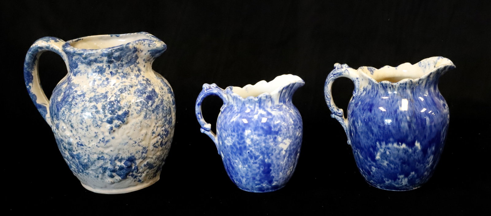 LOT OF BLUE SPONGEWARE PITCHERS (1 of 5)