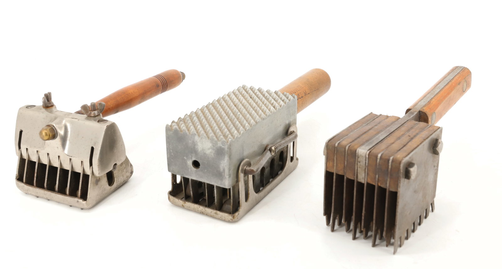(3) ANTIQUE MEAT TENDERIZERS: STEEL WITH WOODEN HANDLES. ONE MRKD. ON HANDLE "BUTCHER....DES MOINES..." 8 1/2" TO 10" LENGTHS. PLEASE READ CAREFULLY - ITEMS MUST BE PAID FOR THROUGH LIVE AUCTIONEERS OR WITH CASH OR CHECK IN