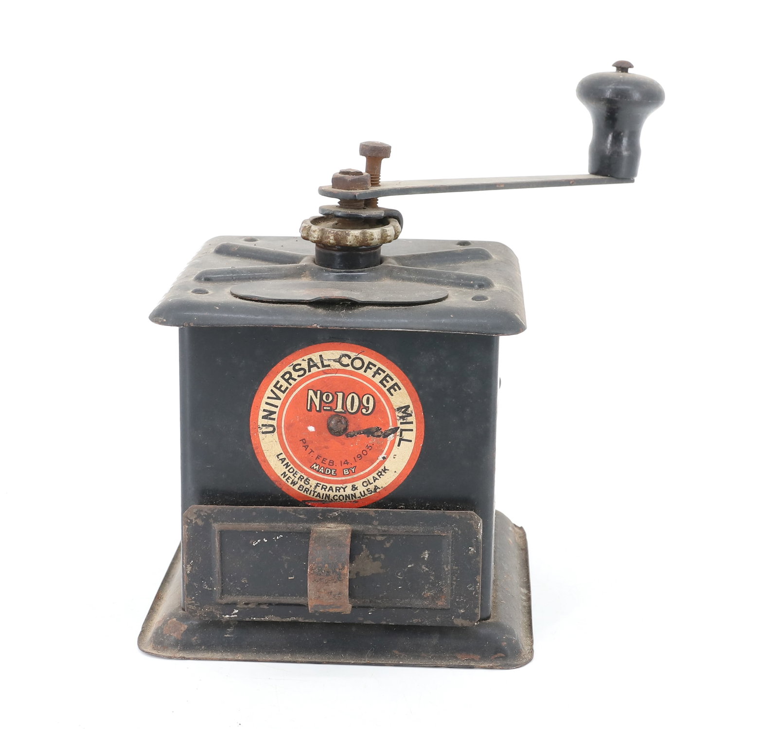 UNIVERSAL COFFEE MILL, NO 109: PAINTED METAL WITH SINGLE DRAWER. ORIGINAL LABEL PAT. 1903 BY LANDERS, FRARY & CLARK, NEW BRITAIN, CONN. 7" X 5" X 5". PLEASE READ CAREFULLY - ITEMS MUST BE PAID FOR THROUGH LIVE AUCTIONEERS OR WITH