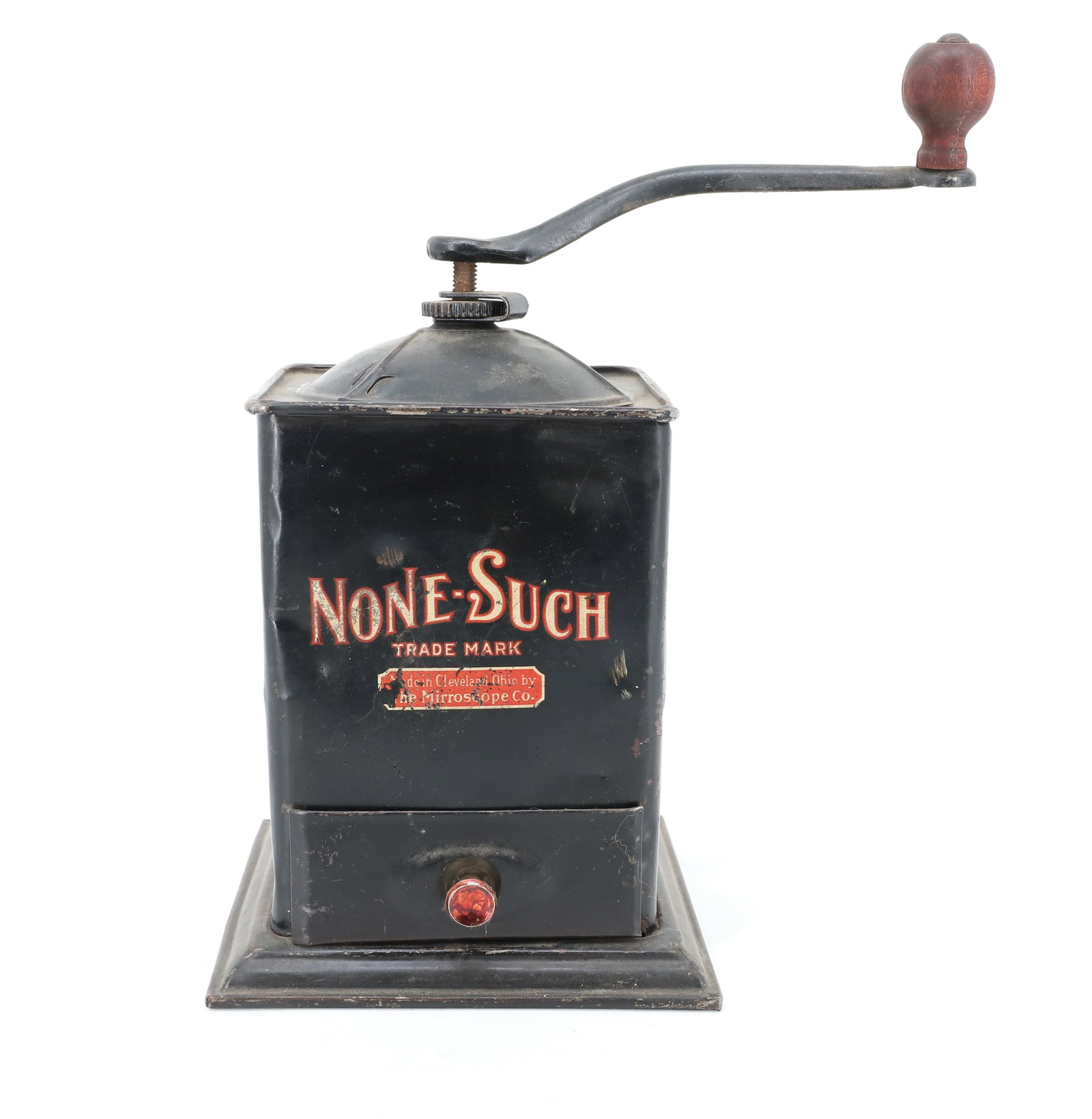 "NONE-SUCH" ANTIQUE COFFEE MILL: BLACK PAINTED METAL WITH SINGLE DRAWER. ORIGINAL LABEL ON FRONT "MADE IN CLEVELAND, OHIO BY THE MIRROSCOPE CO." 11 1/2" X 6 1/4" X 6 1/4". PLEASE READ CAREFULLY - ITEMS MUST BE PAID FOR THROUGH LIVE
