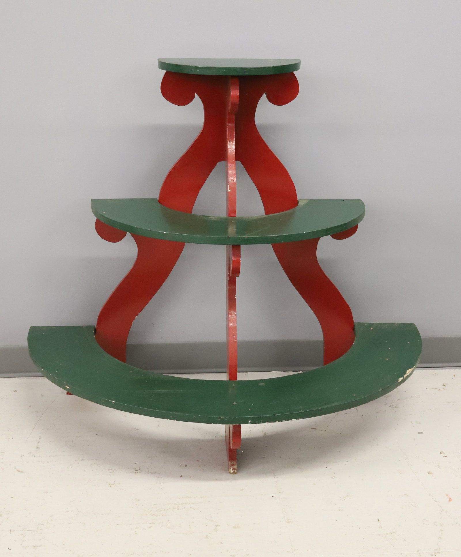 PAINTED PLANT STAND: THREE TIER PLANT STAND IN RED / GREEN PAINT. 36" X 42" X 19 1/2". PLEASE READ CAREFULLY - ITEMS MUST BE PAID FOR THROUGH LIVE AUCTIONEERS OR WITH CASH OR CHECK IN PERSON - Terms for Purchasing and Shi