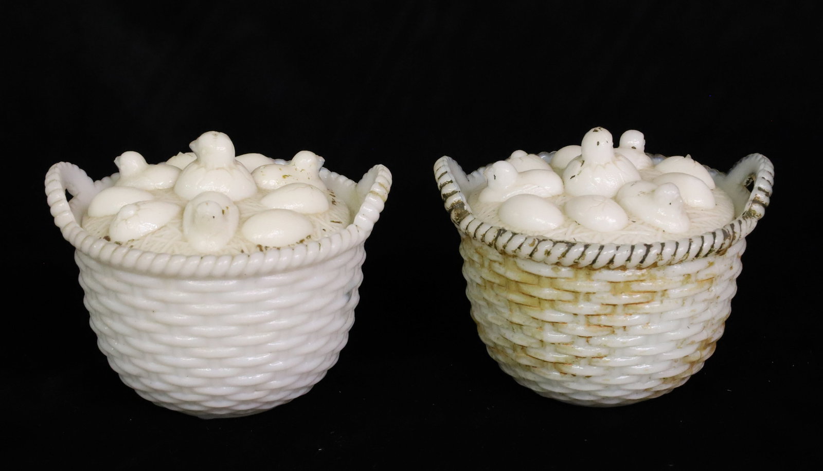 (2) MILK GLASS CHICKS/EGGS IN BASKET: MOLDED MILK GLASS WITH LIDS WITH EGGS AND CHICKS. TRACES OF ORIGINAL PAINT. 3 1/4" X 4". PLEASE READ CAREFULLY - ITEMS MUST BE PAID FOR THROUGH LIVE AUCTIONEERS OR WITH CASH OR CHECK IN PERSON -