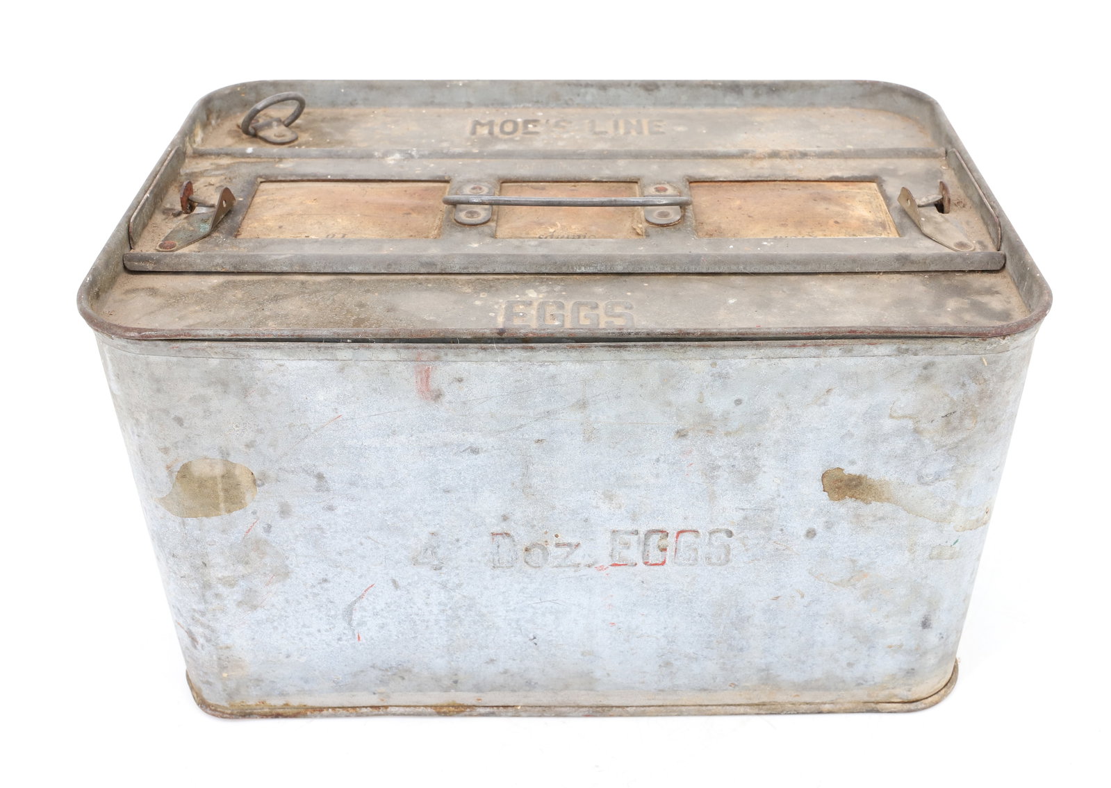 MOE'S LINE EGG CARRIER: GALVANIZED METAL WITH REMOVABLE LID. HOLDS 4 DOZEN EGGS. INDIVIDUAL CARDBOARD HOLDERS INTERIOR. 6 3/4" X 11 3/4" X 7 3/4". PLEASE READ CAREFULLY - ITEMS MUST BE PAID FOR THROUGH LIVE AUCTIONEERS OR